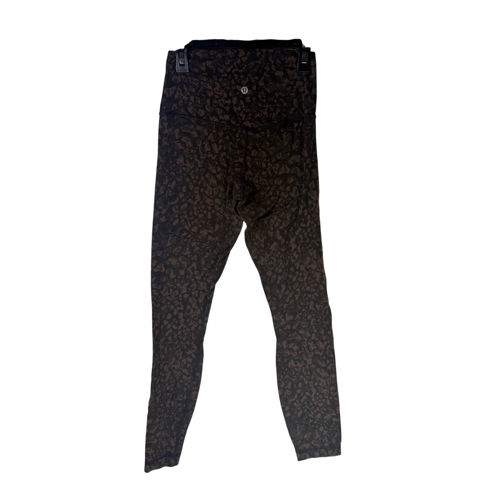 Lululemon women’s Align high-rise leggings in brown and black camo, 25-inch length, size 4, with a snug fit and stretchy fabric.