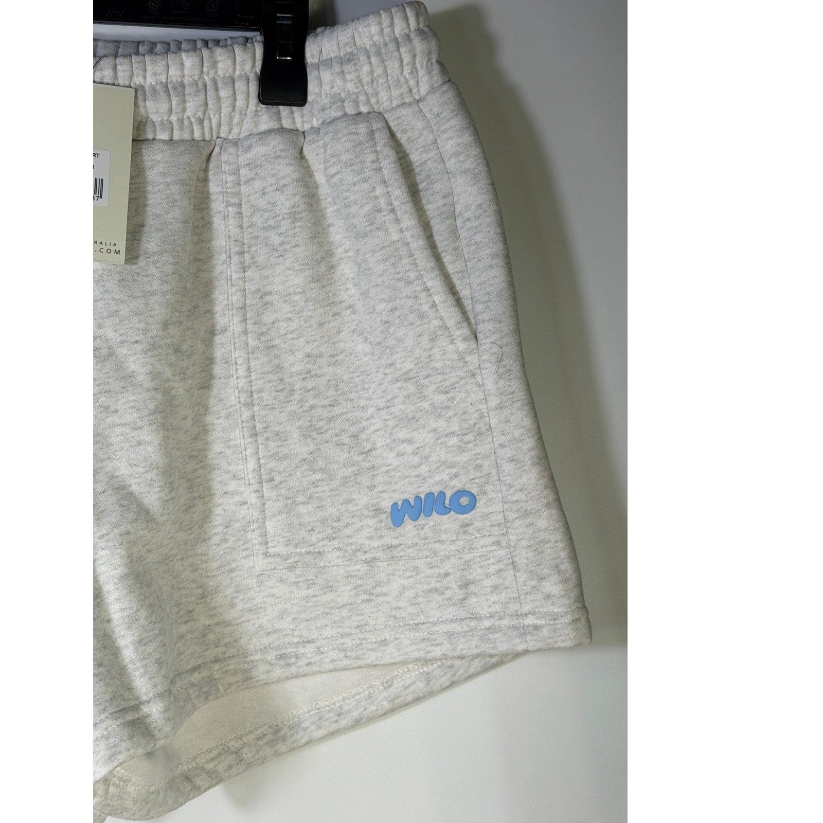 WILO The Label women's white marle fleece jog shorts, size large, front view with elastic waistband and relaxed fit.