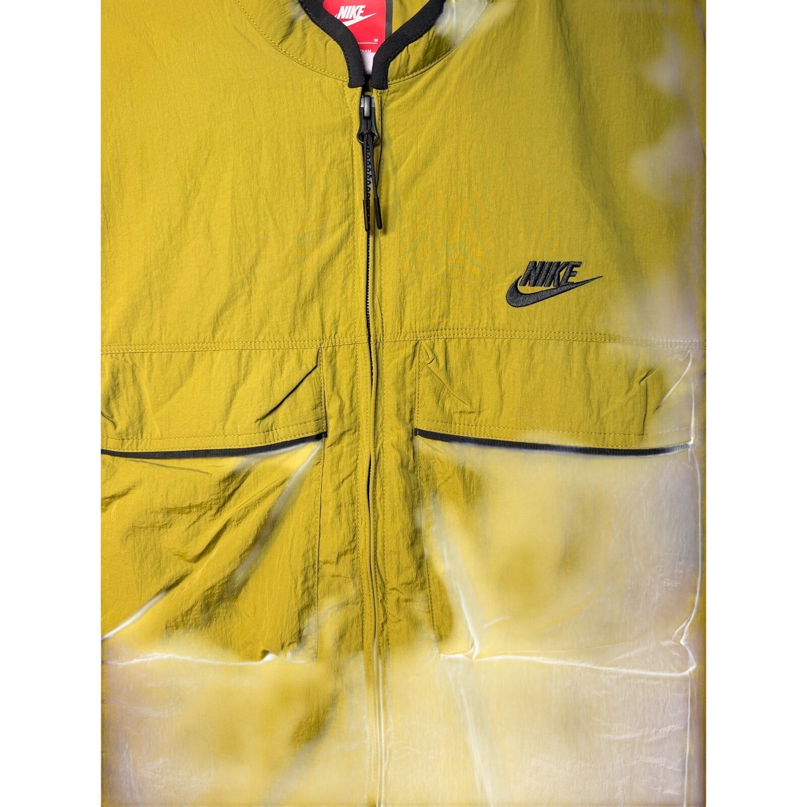 Nike Tech Woven Utility Wind Vest for men in green, full zip, lightweight windbreaker with utility pockets.