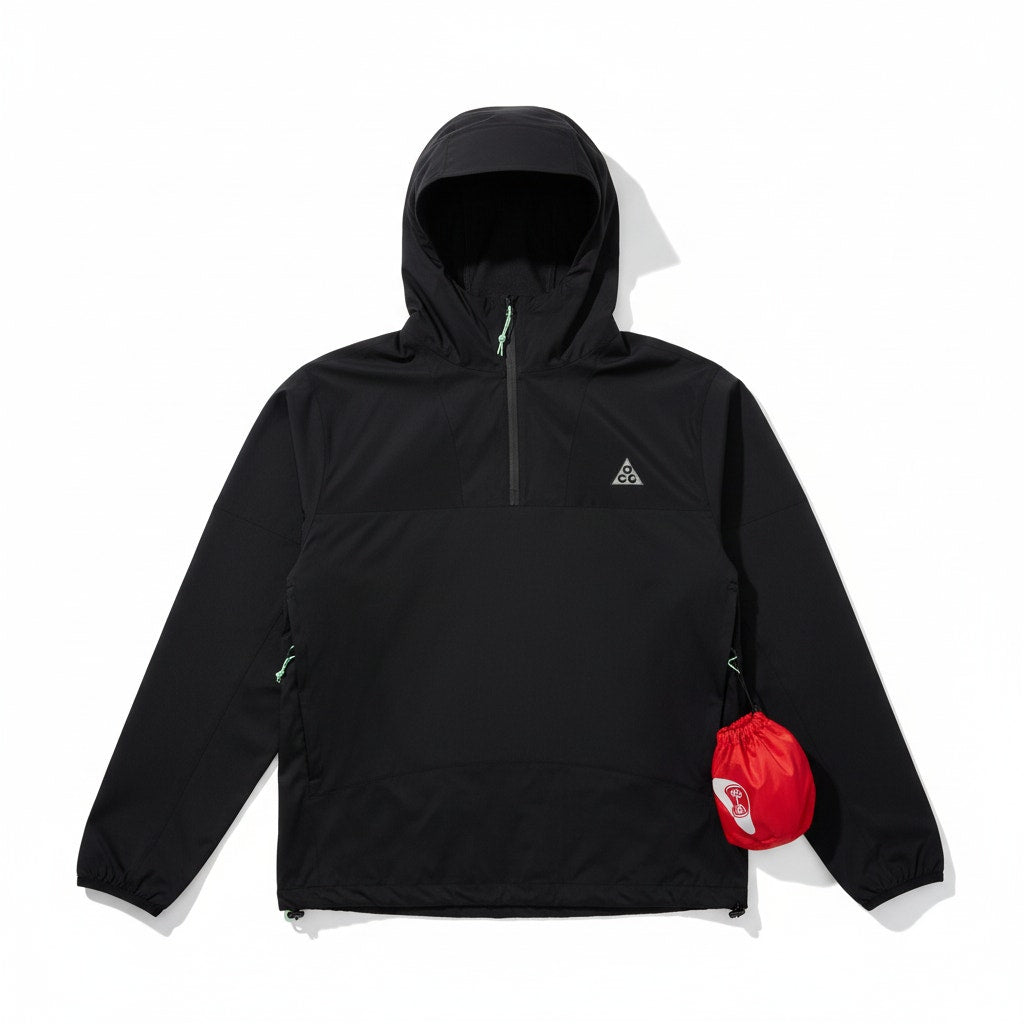 Men’s Nike ACG Trail Snacks Storm-FIT ADV jacket in black, displayed on a hanger with a zippered front and storm-resistant design.