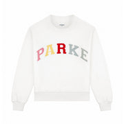 White PARKE Heritage Varsity Mockneck Sweatshirt for women, cozy pullover with a varsity style, size XL.