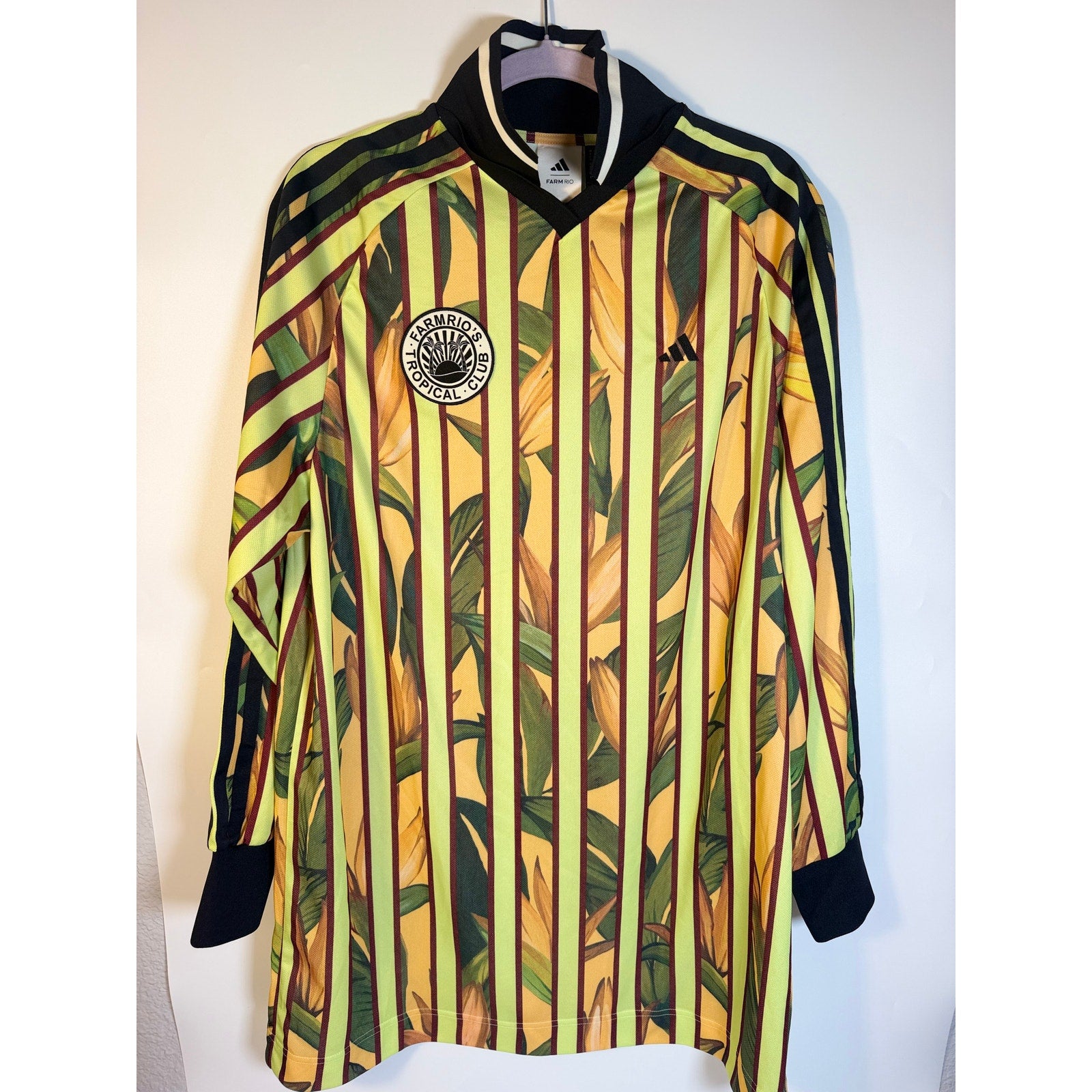 Adidas x Farm Rio women's premium jersey dress in size medium, vibrant floral pattern, new with tags, lightweight and comfortable.