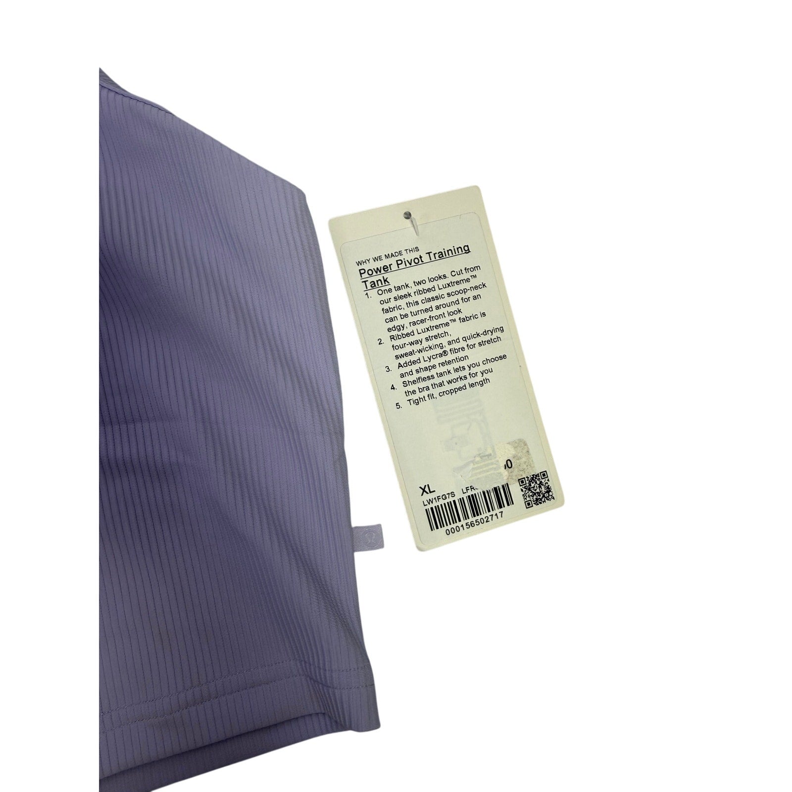 Lululemon Power Pivot training tank top in Lavender Frost, size XL, displayed flat with fabric details and branding visible.
