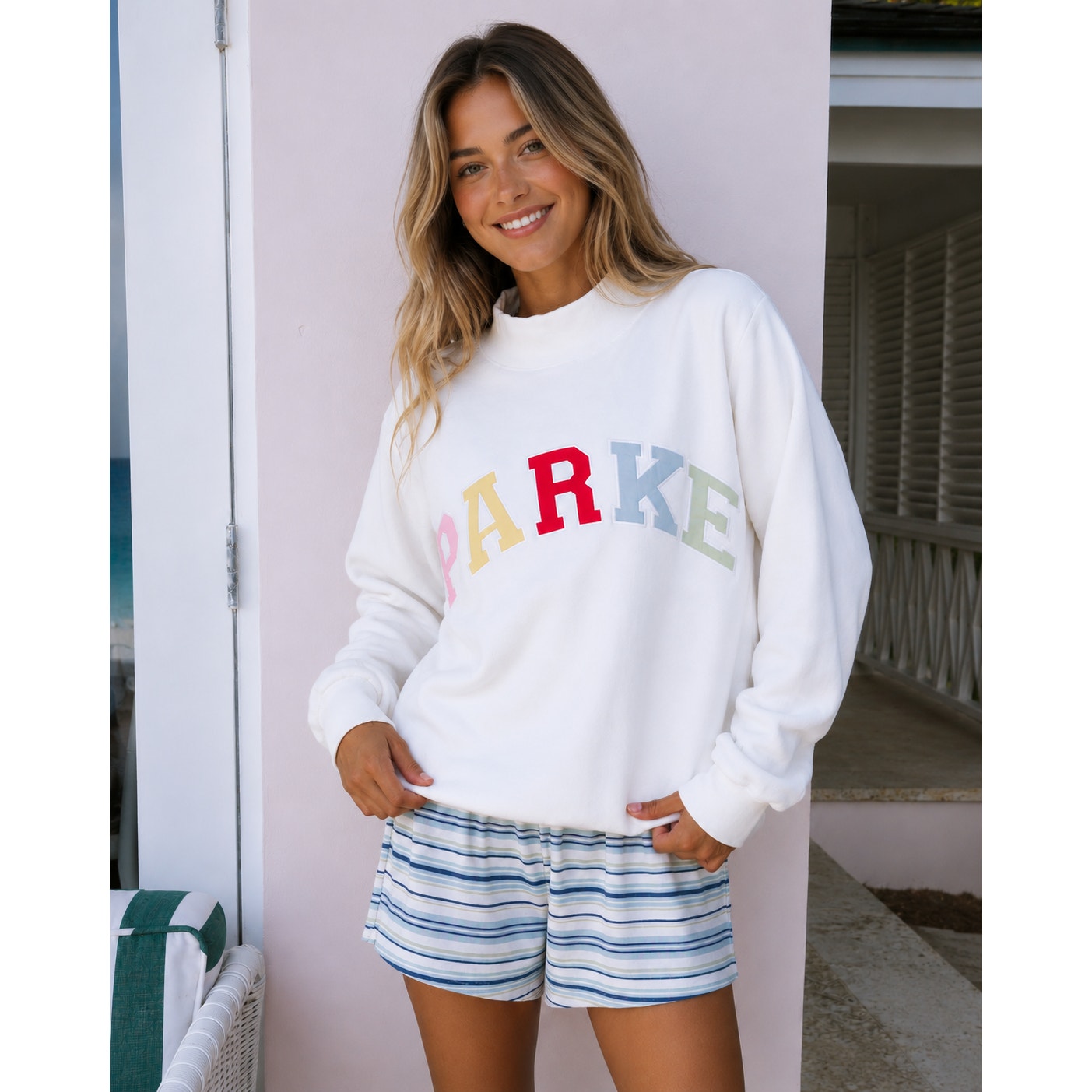 White PARKE Heritage Varsity Mockneck Sweatshirt for women, pullover style, size XL, with ribbed cuffs and collar.