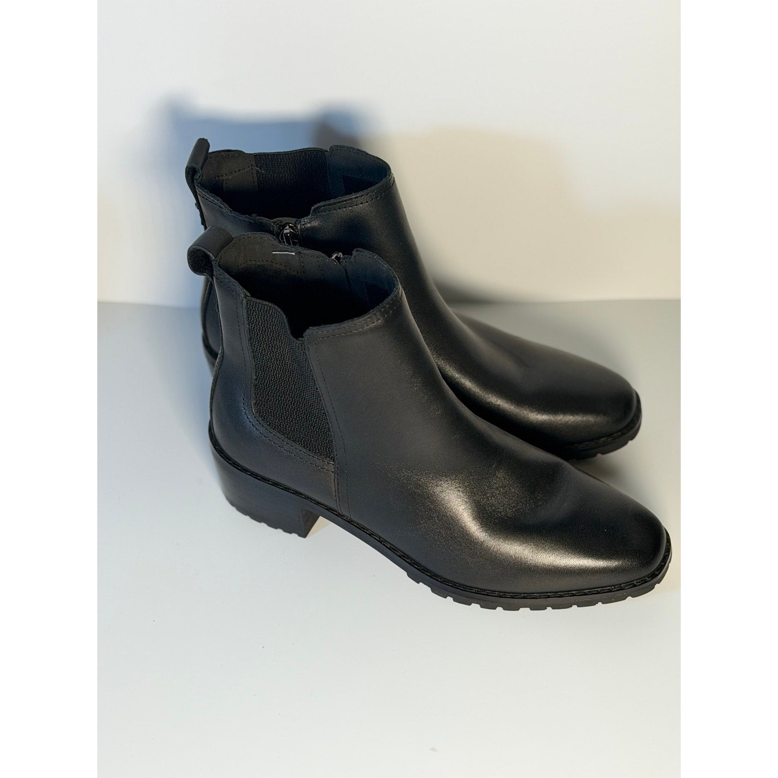 Easy Spirit women's black Chelsea ankle boots with side zip, size 8.5M, pre-owned, stylish and comfortable footwear.