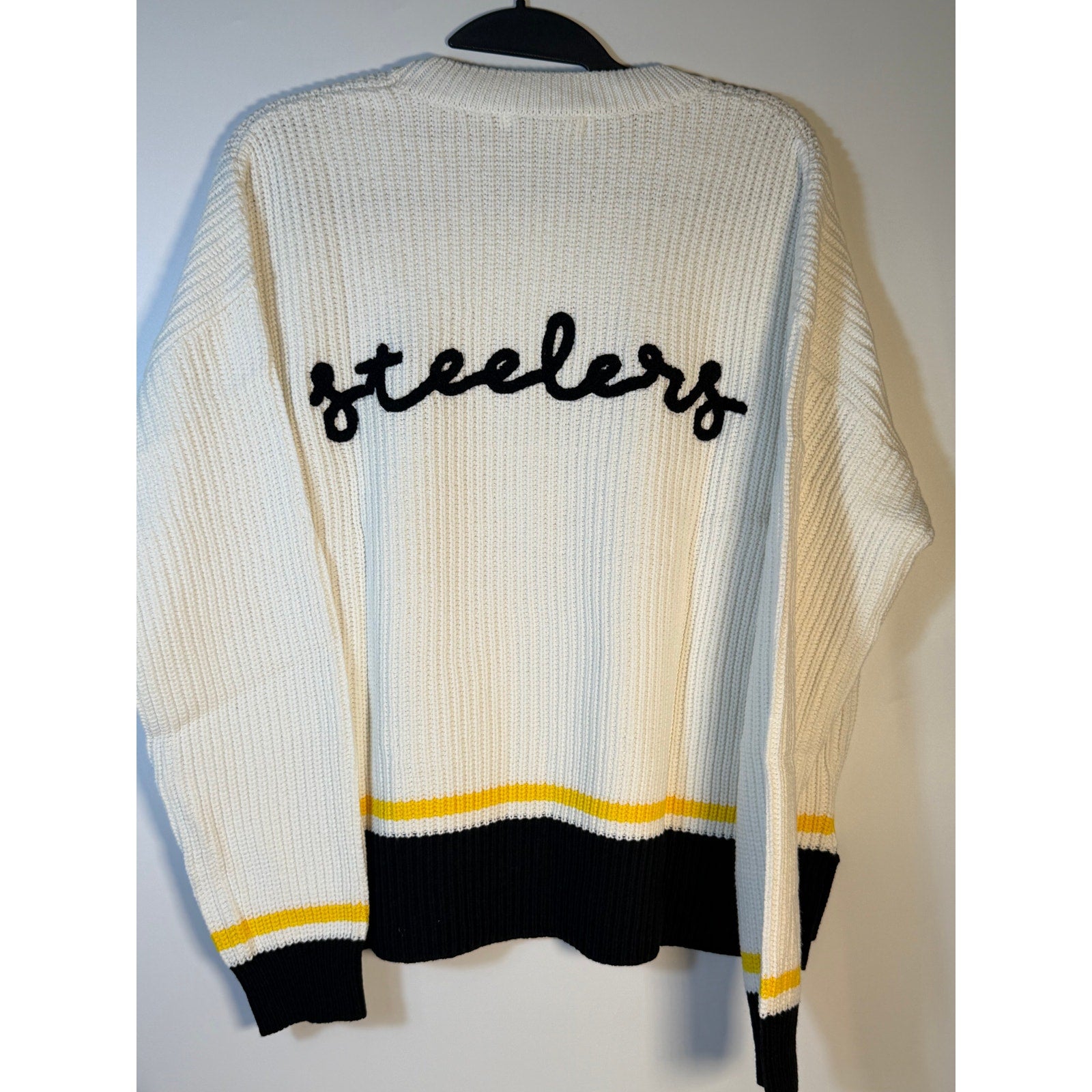 Women's Pittsburgh Steelers knit sweater by Wear by Erin Andrews, featuring team logo and cozy design, new with tags.