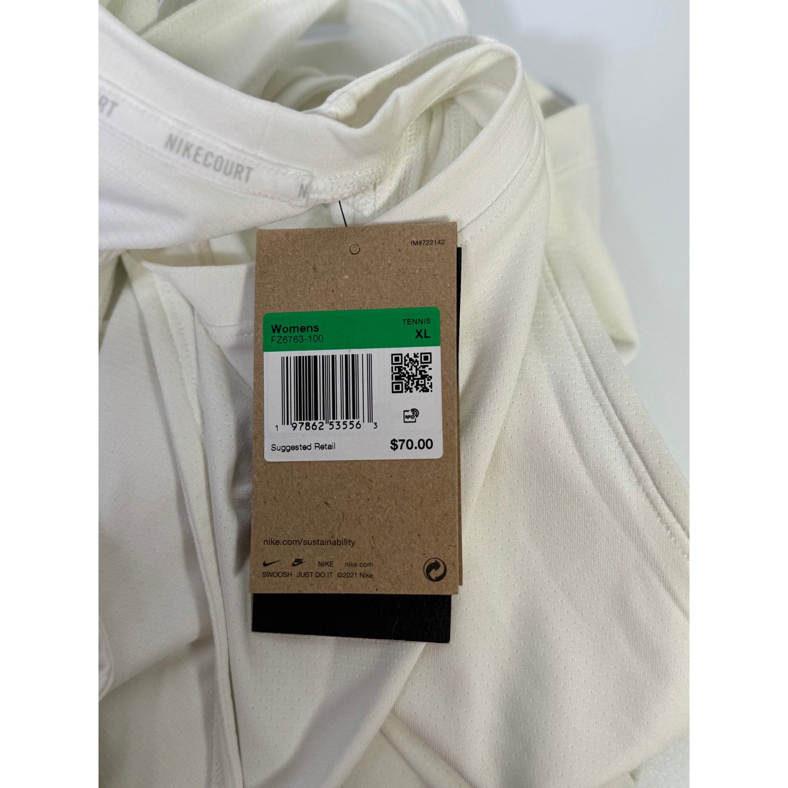 NikeCourt women's tennis tank top in white, size XL, lightweight athletic top with breathable fabric and sporty design.