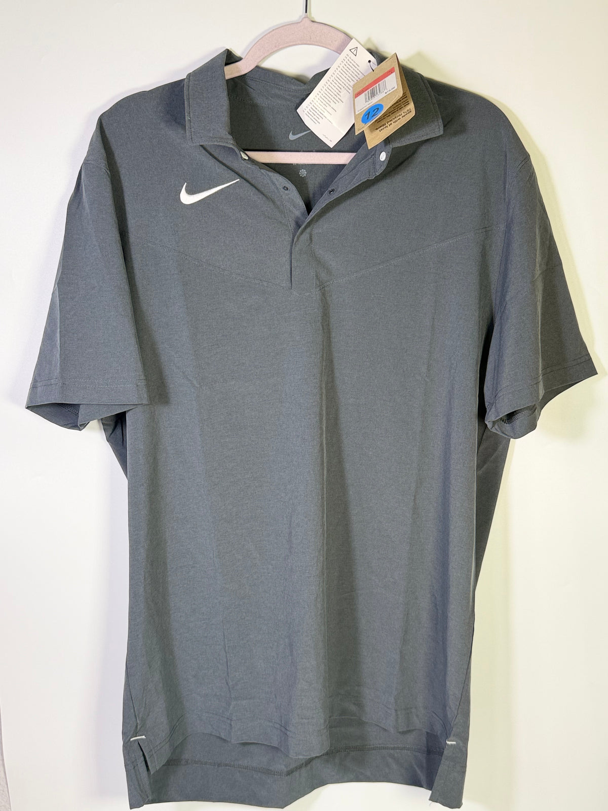 Nike Dri-FIT men's gray football sideline polo shirt, large size, showing the breathable athletic polo with Nike logo.