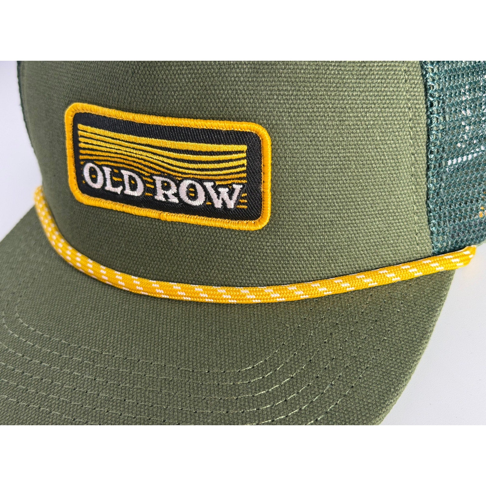 Old Row olive green rope trucker hat with adjustable snapback strap and embroidered branding, casual outdoor style.