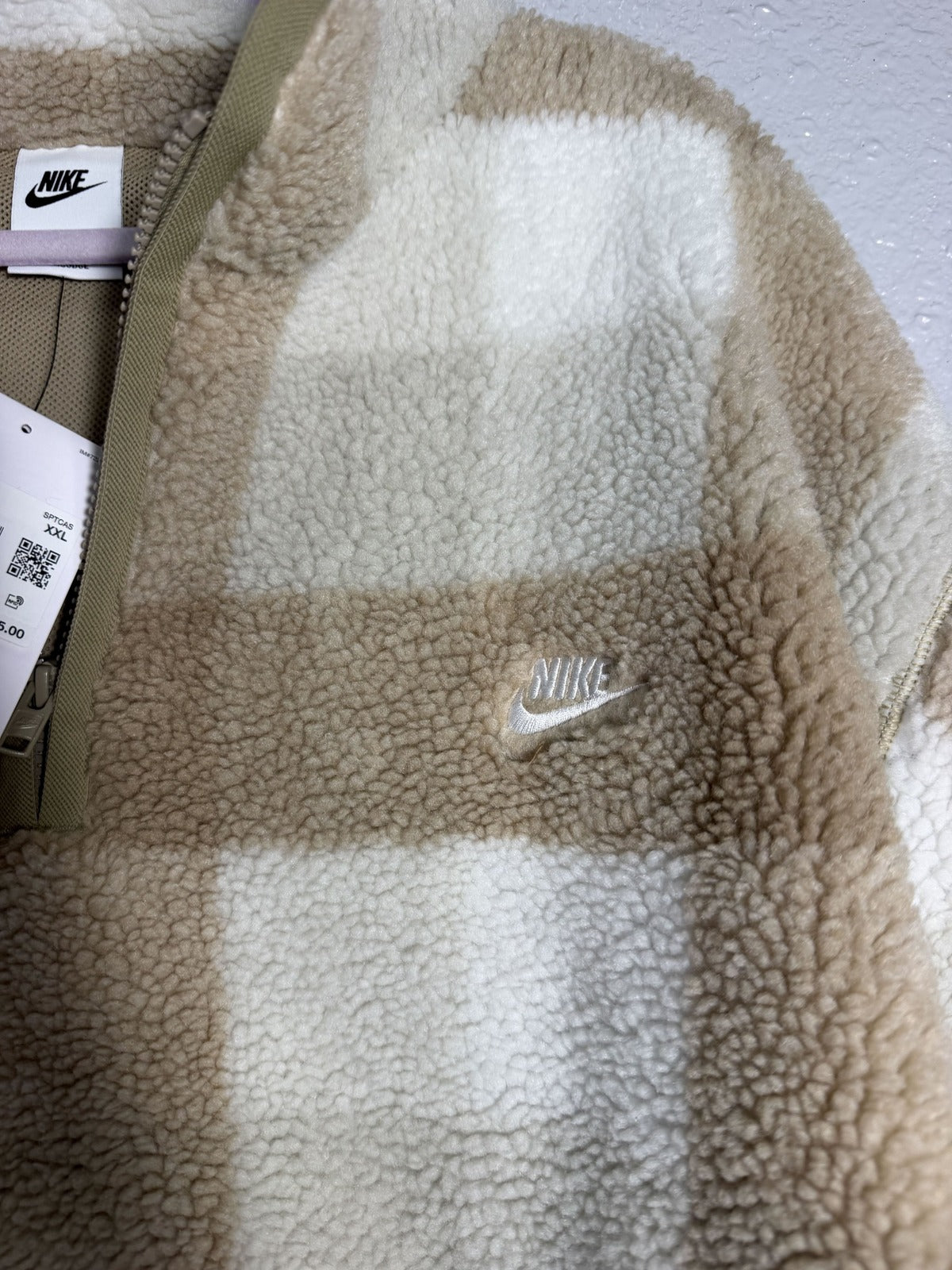 Nike Club Sherpa plaid half-zip pullover men's jacket in khaki and cream, featuring a cozy sherpa lining and casual style.