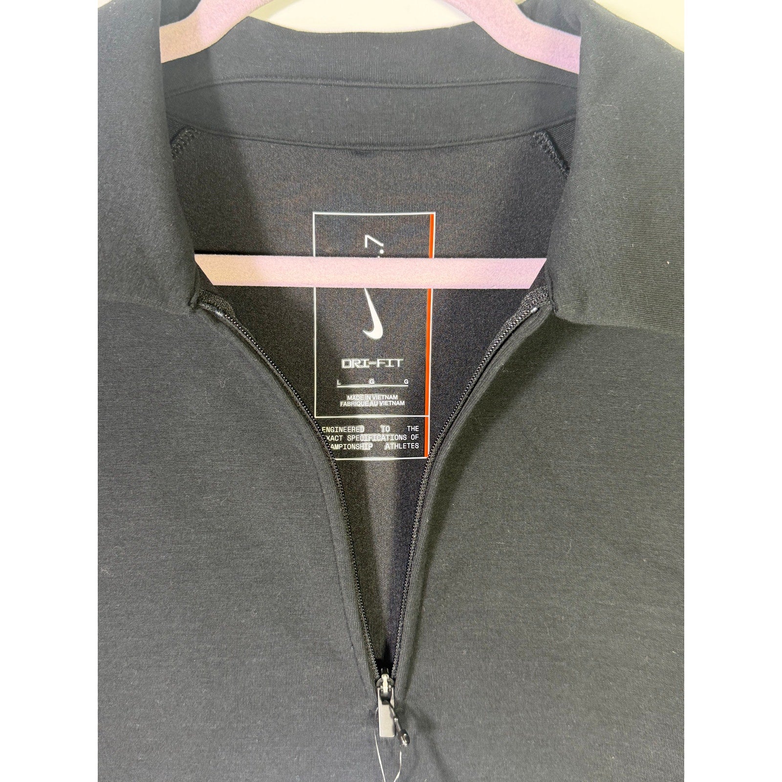 Nike Dri-FIT men's black 1/4 zip golf polo shirt, short sleeve, size L, new with tags, displayed flat.