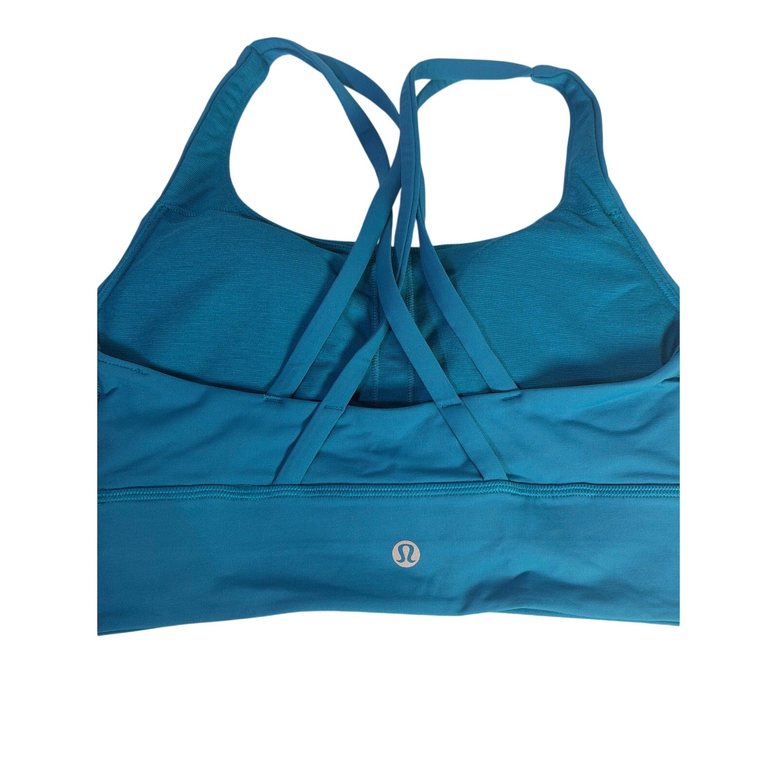 Lululemon women's teal blue strappy longline sports bra with supportive design, size 4, shown on a mannequin.