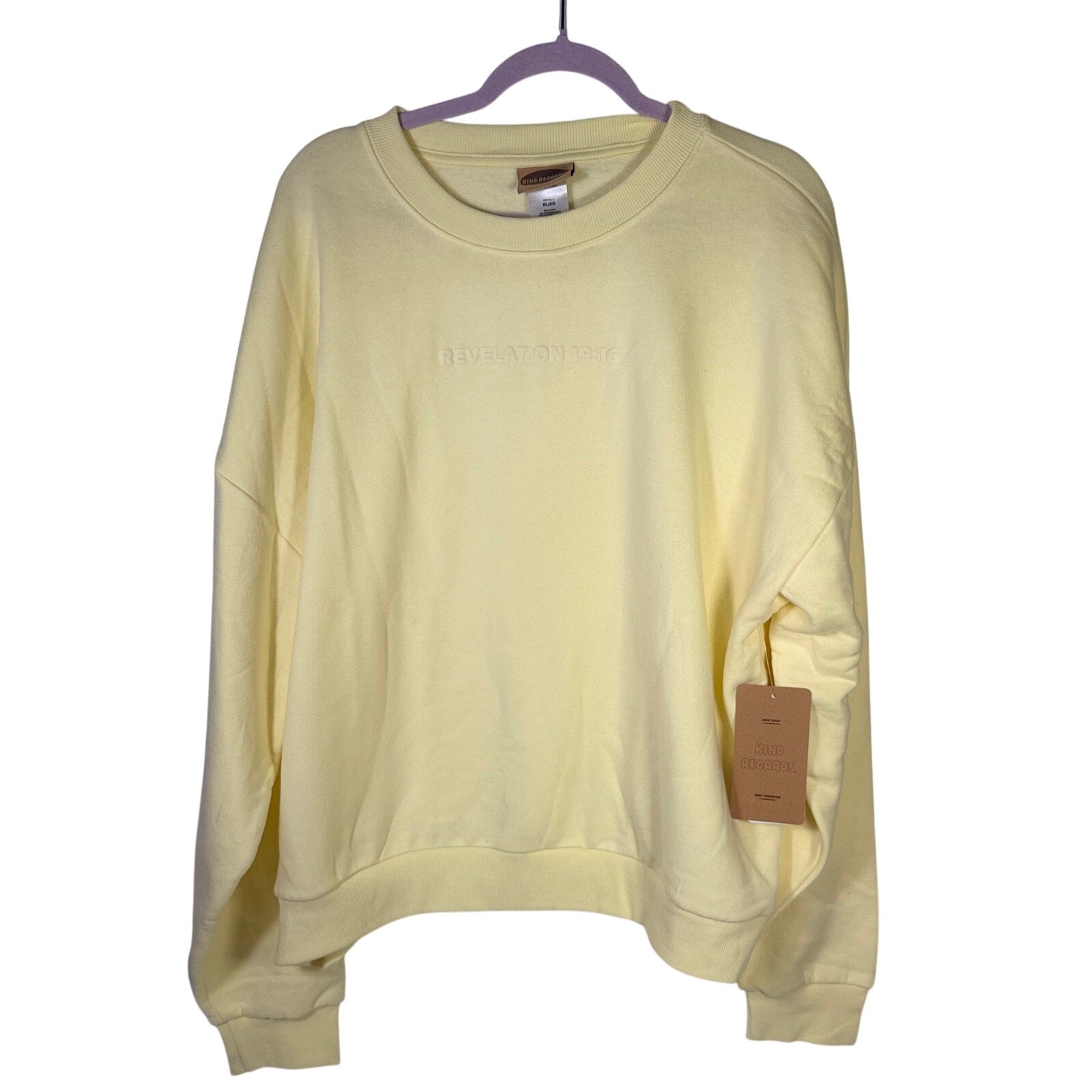 Yellow crewneck sweatshirt by Kind Regards featuring a Revelation 19:16 Jesus is King design, size XL.