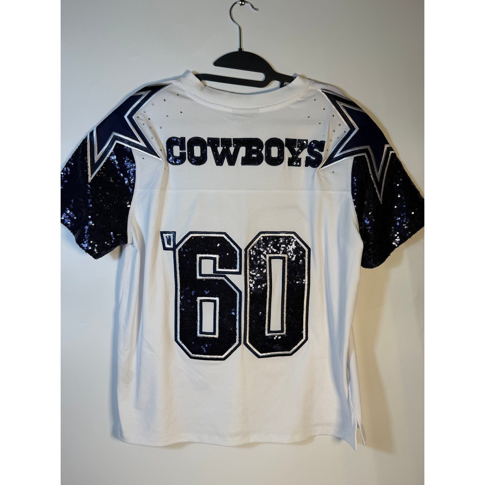 White Dallas Cowboys sequin jersey for women by Wear by Erin Andrews, large size, NFL team apparel, front view.