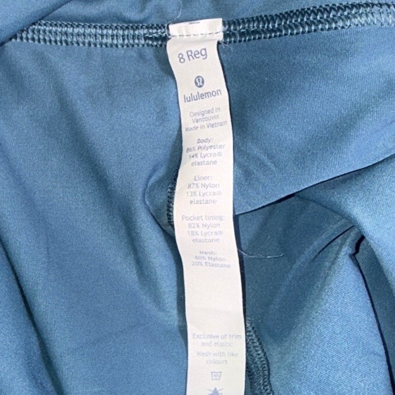 Lululemon Athletica women's ruffle pleated skirt in size 8 with back pocket, showcasing a stylish, flowy design.