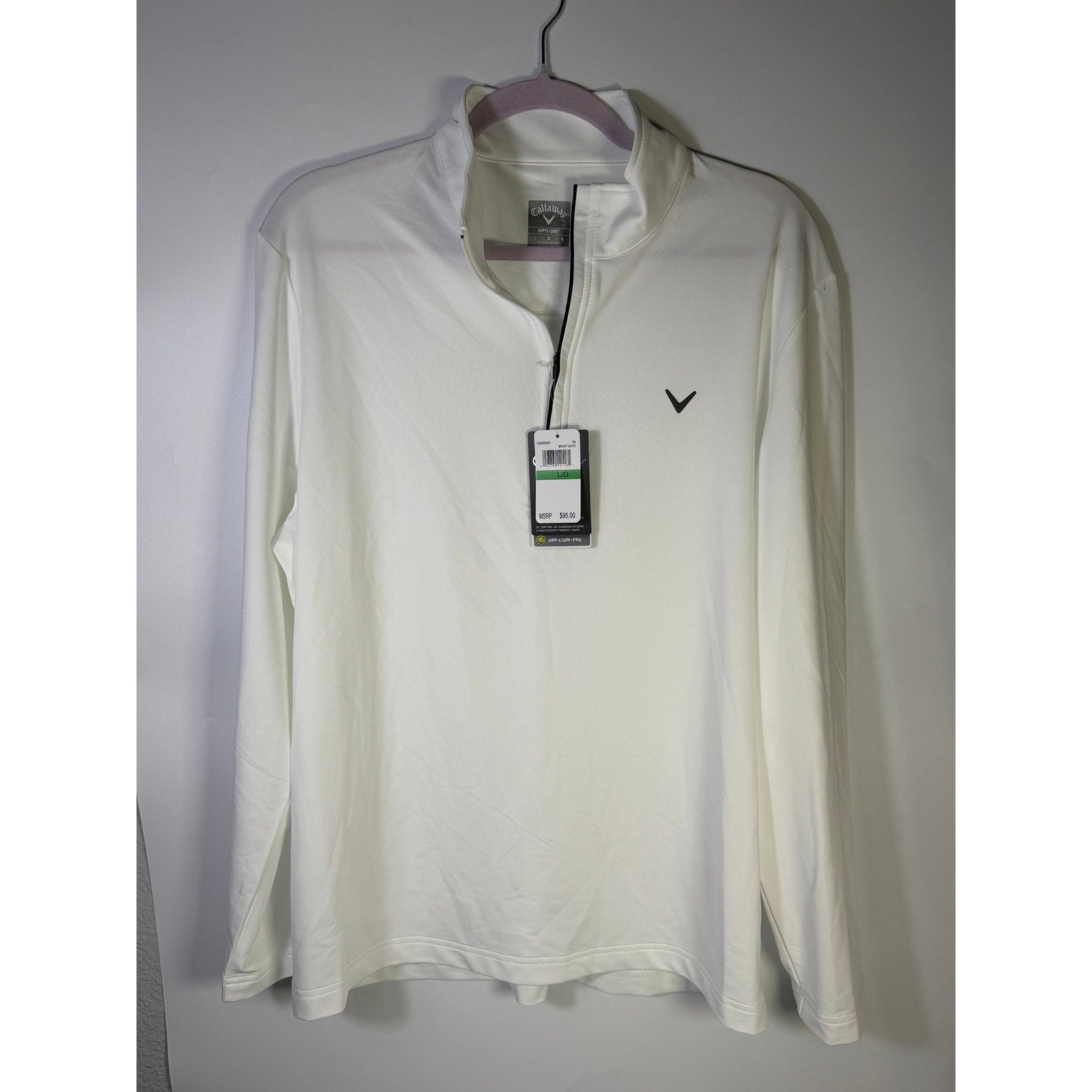 White Callaway women’s Opti-Dri quarter zip golf sweatshirt, size large, featuring a comfortable athletic fit and soft fabric.