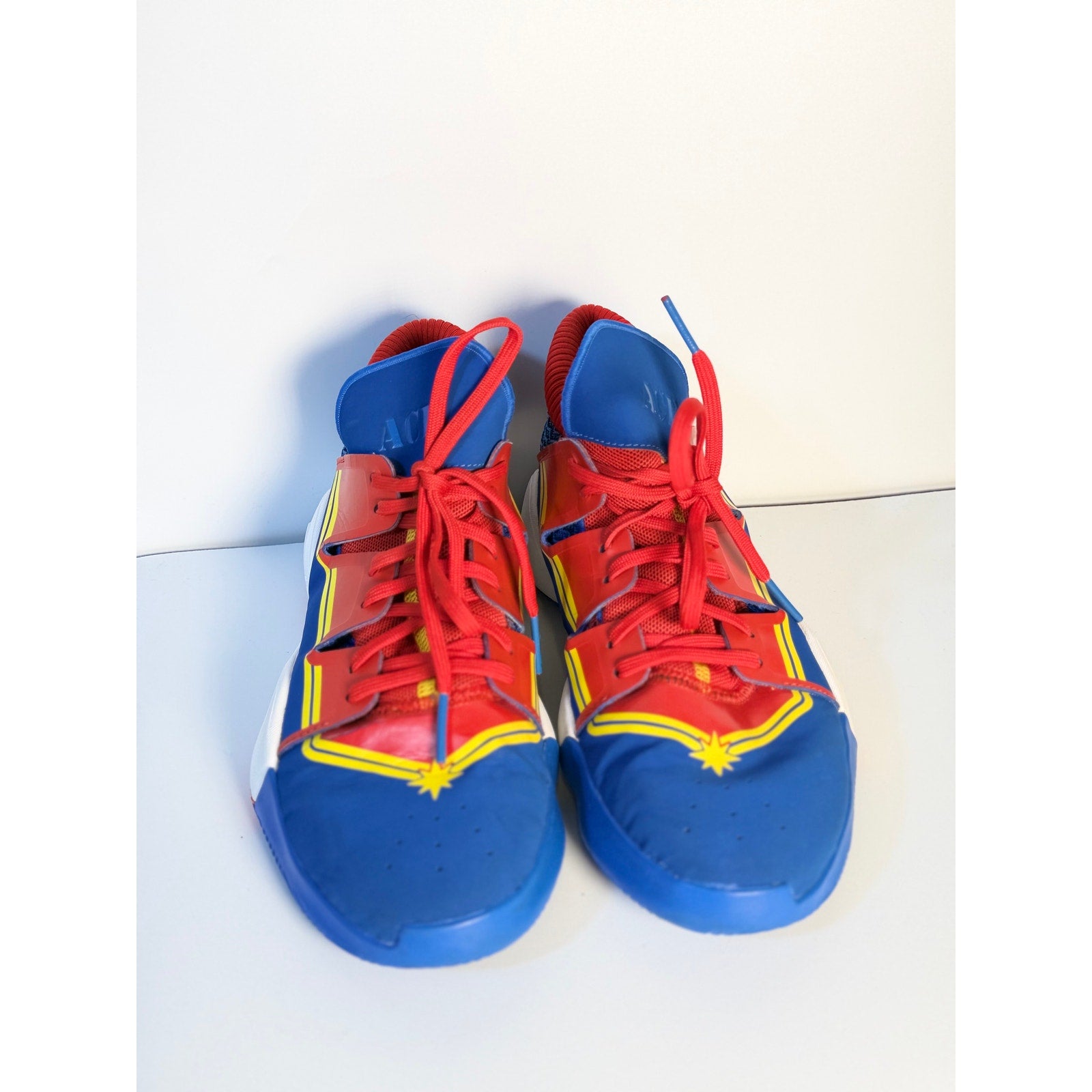 Adidas Exhibit A Captain Marvel basketball shoes in blue and red for men, US size 7, featuring athletic design and branding details.