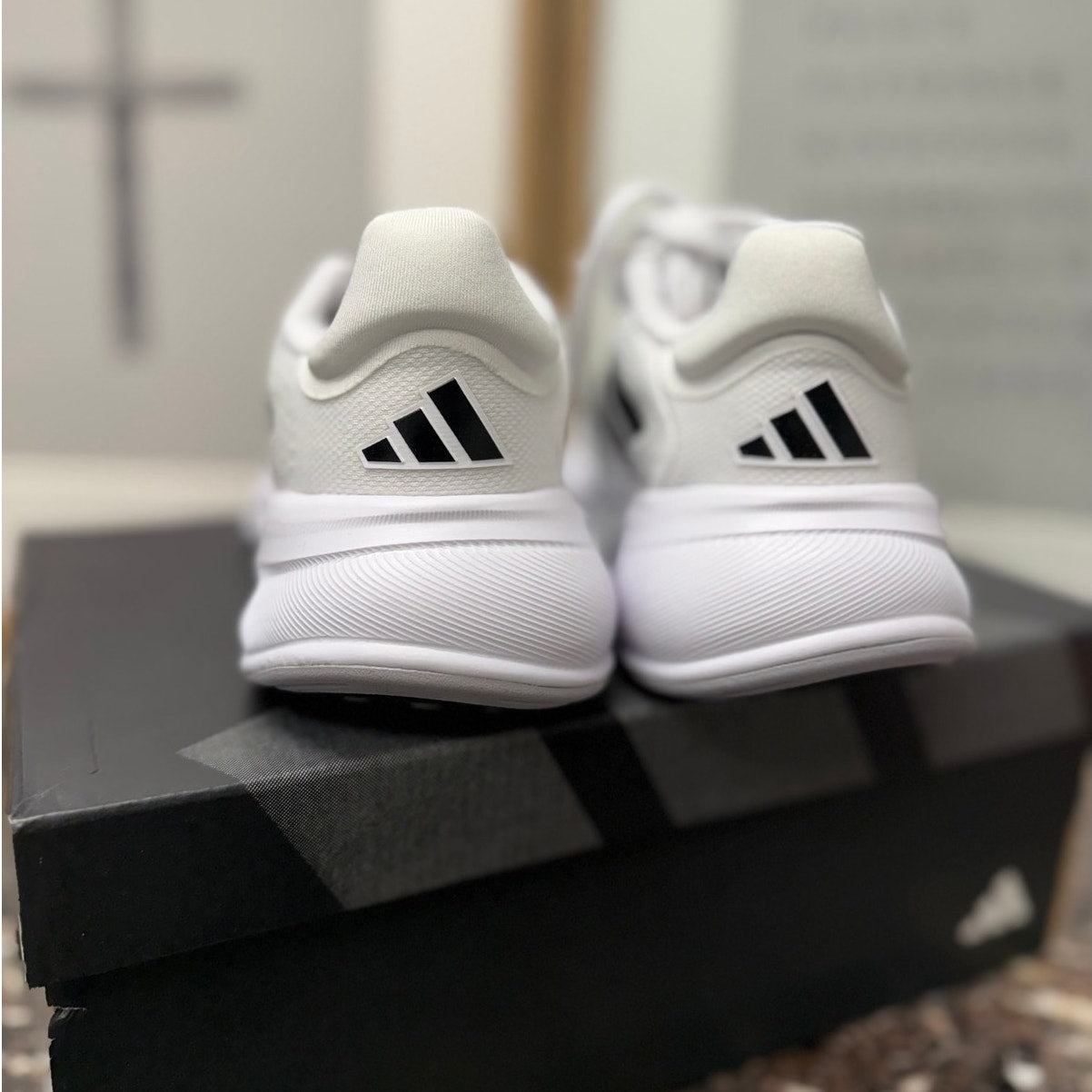 Adidas Response Super women's running sneakers in white, black, and silver, size 7.5, with cushioned athletic design