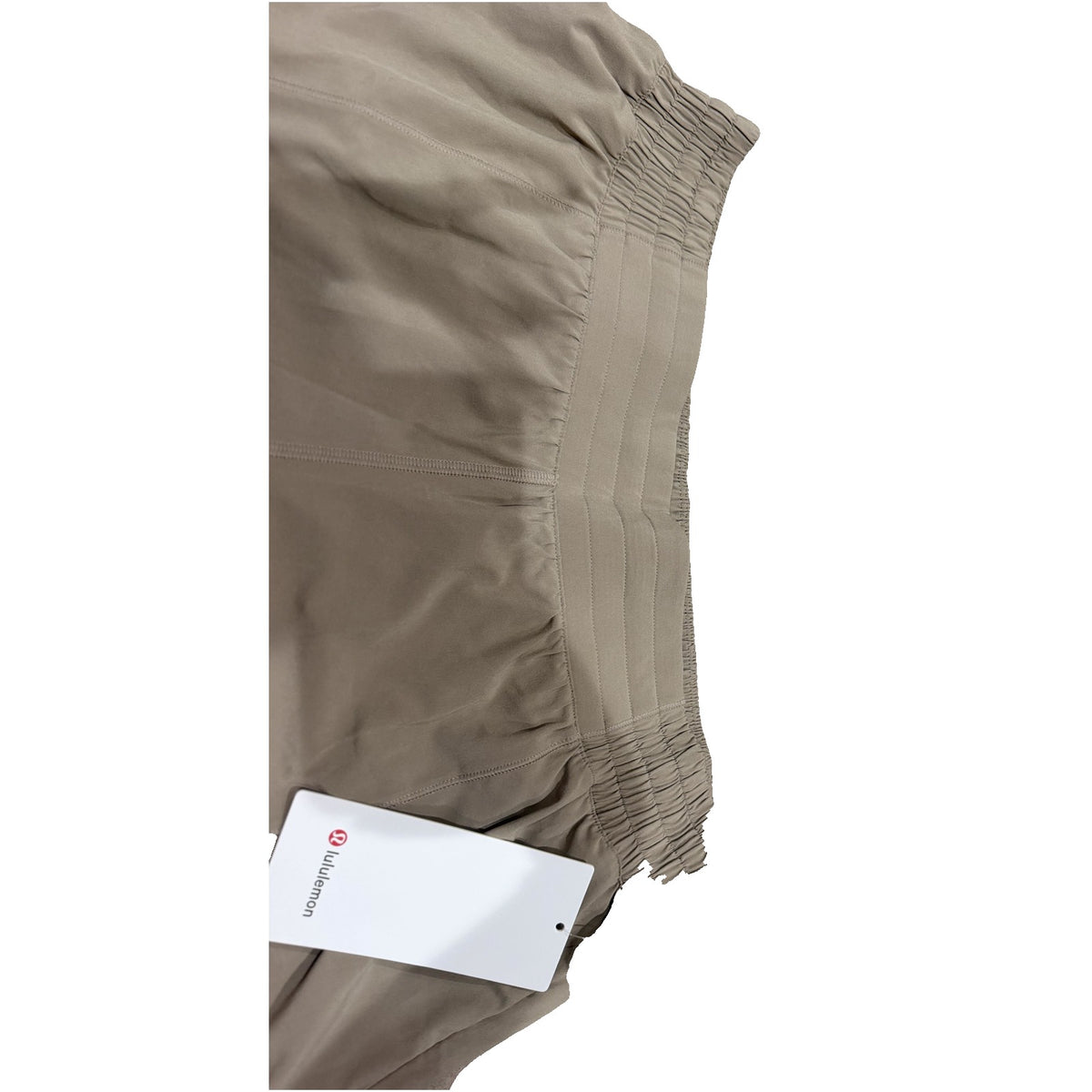 Lululemon Hotty Hot high-rise lined running shorts in tan beige for women, size 14, with a comfortable fit and athletic design