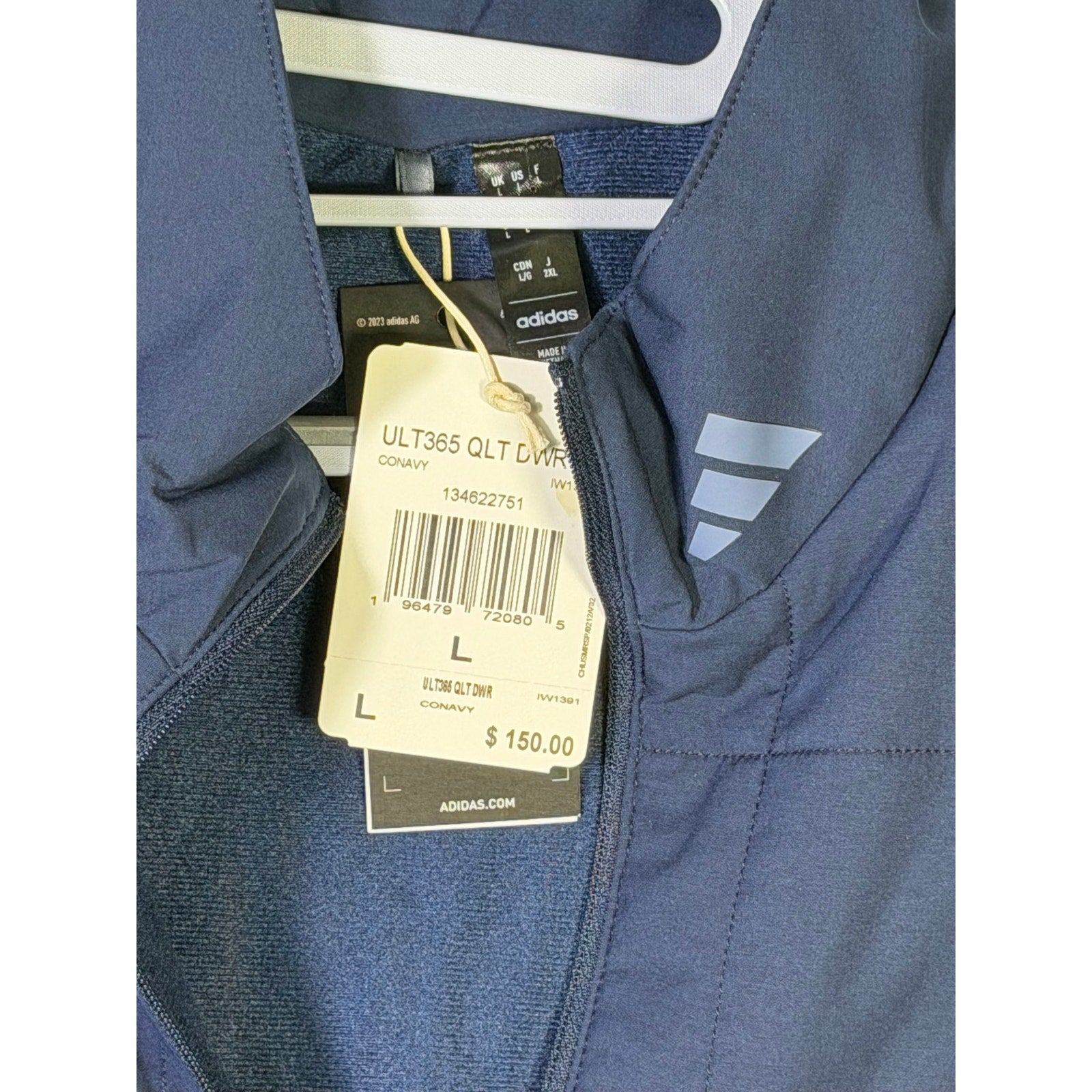 Adidas Ultimate365 quilted DWR men's navy blue golf jacket, size L, showing front view with quilted texture and zip closure.