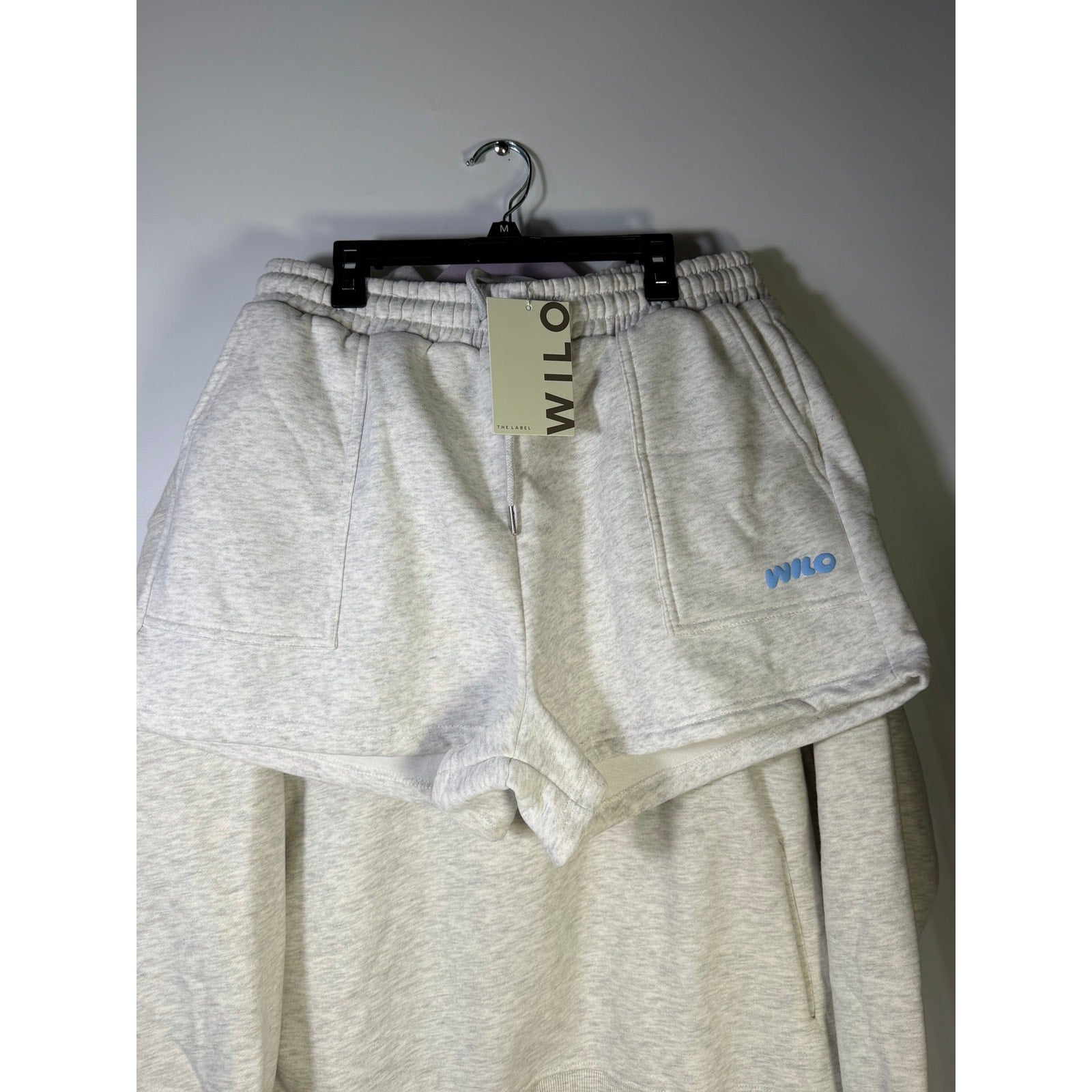 WILO The Label women's 2-piece hoodie and shorts outfit set in white marle blue, featuring a hoodie and matching shorts.