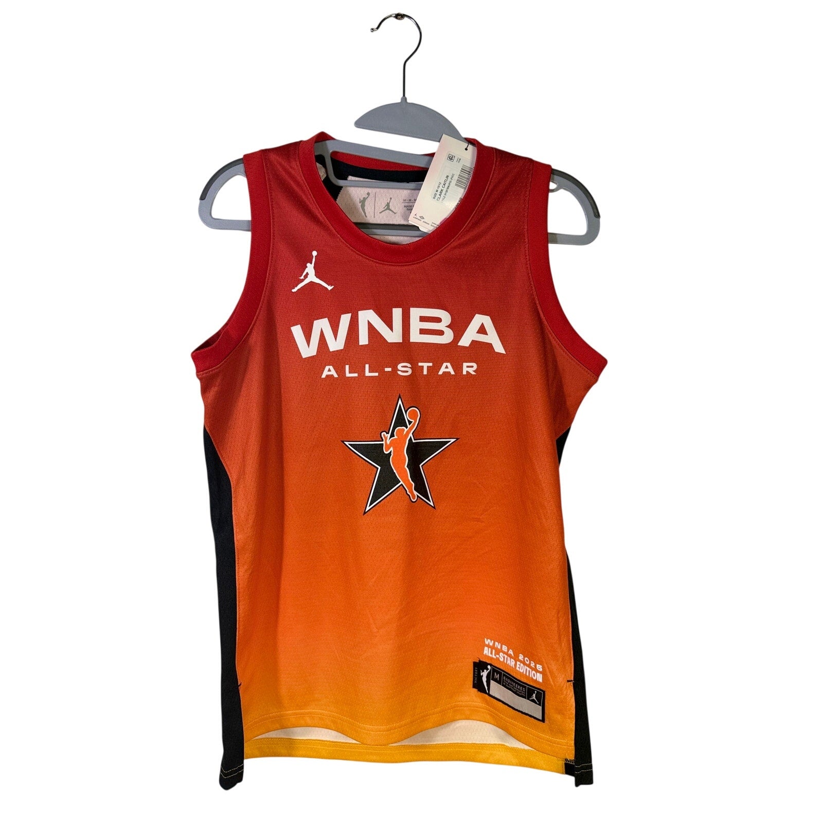 Youth Jordan WNBA All-Star 2025 Caitlin Clark #22 Jersey in medium size, new with tags, featuring team and player details.