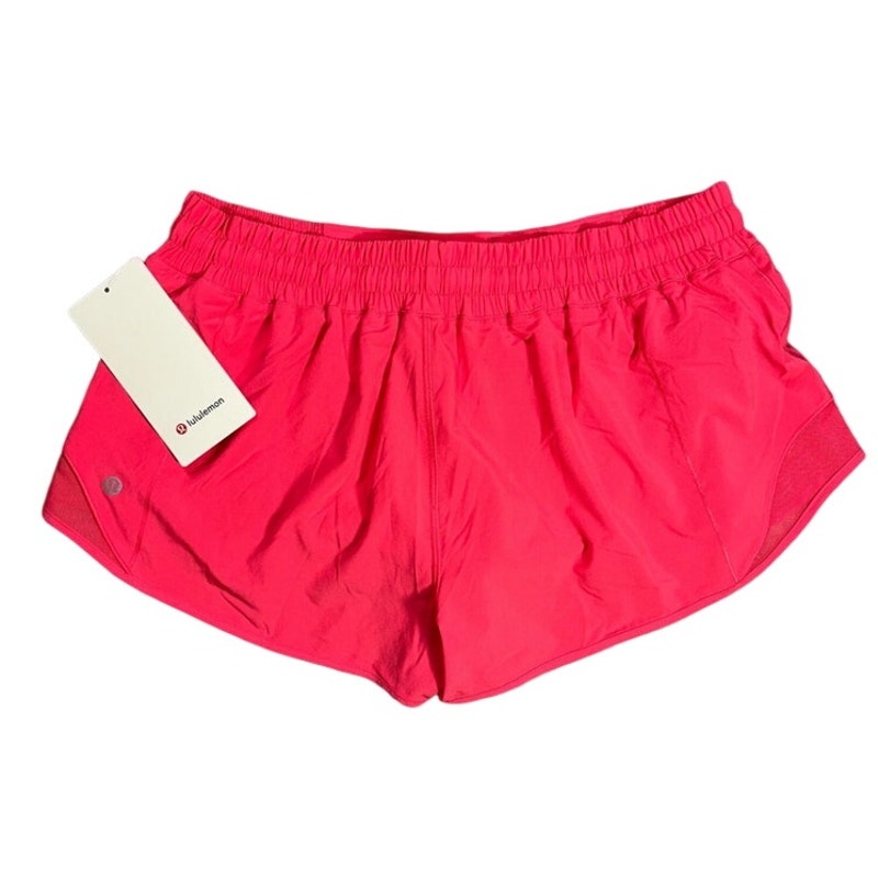 Lululemon Hotty Hot Short 2.5-inch in Lipgloss Pink, size 14, new with tags, showcasing lightweight athletic shorts.