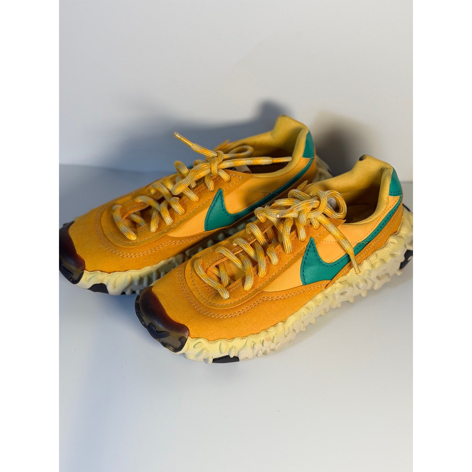 Nike OverBreak SP men's sneakers in Pollen Rise and Neptune Green with sporty design and textured details.
