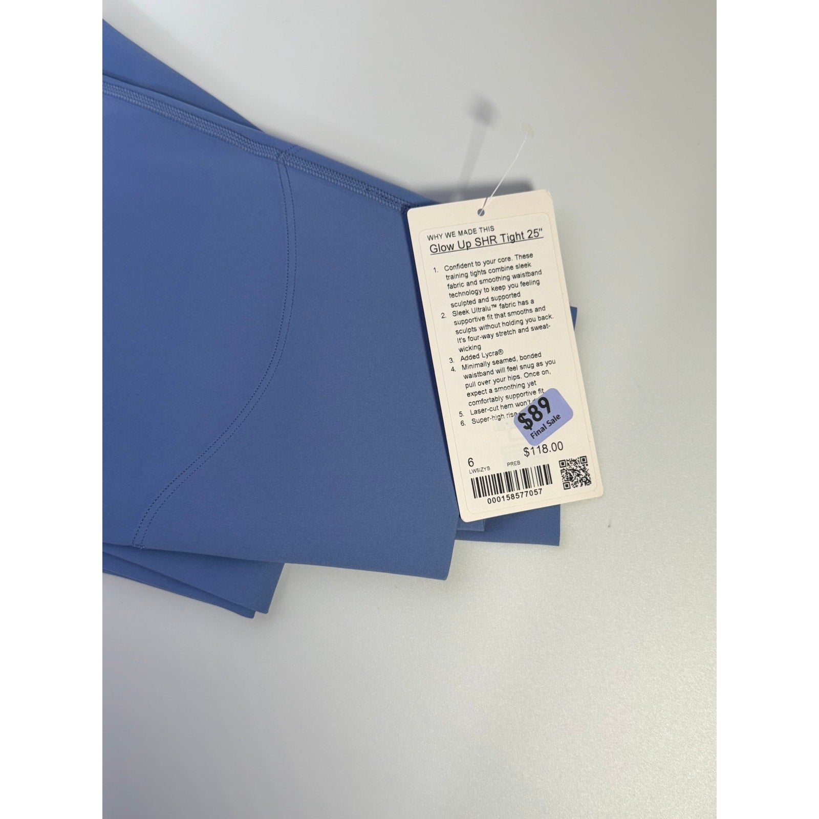 Lululemon Glow Up super-high-rise leggings in prep blue, size 6, showcasing the fitted design and high waistband.