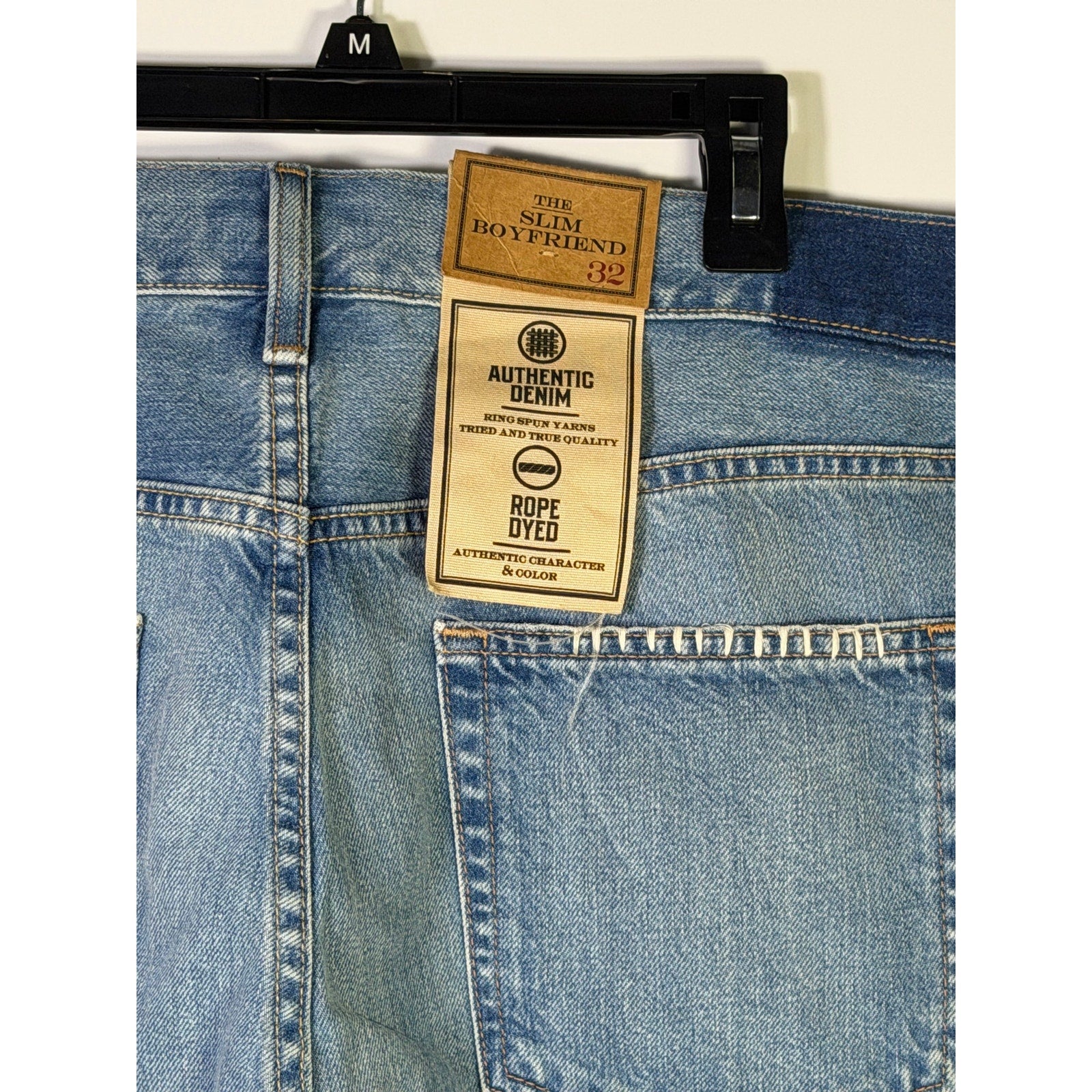 Polo Ralph Lauren men's slim boyfriend patchwork distressed jeans in size 32, showing front view with faded and torn details.