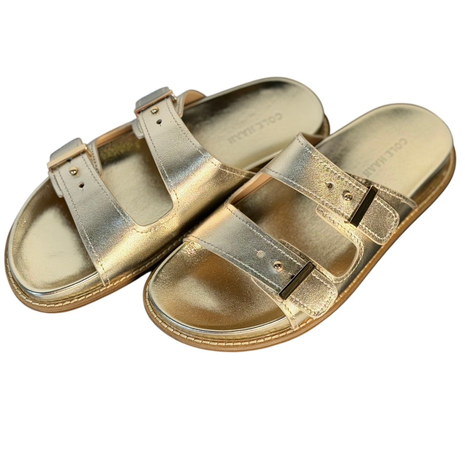 Cole Haan women's gold leather double strap sandals with footbed, size 7B, featuring stylish design and open toe.