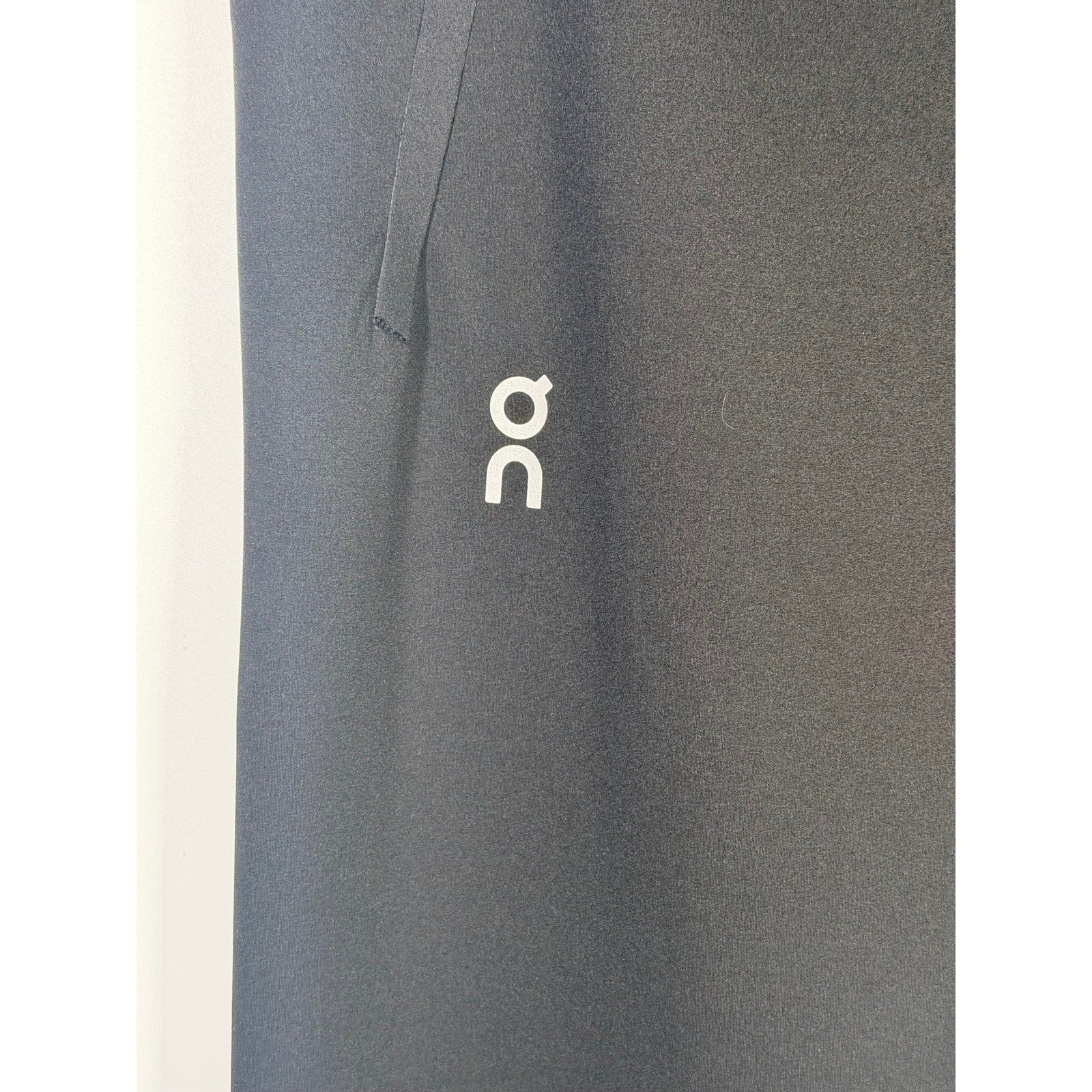 Black On Women’s Train Tights 7/8 leggings, size M, shown laid flat with elastic waistband and sleek fit, new with tags.