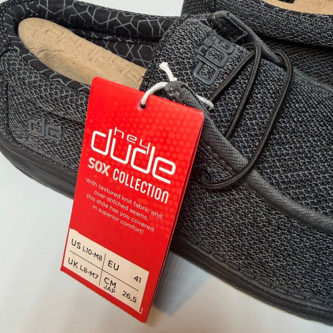 Hey Dude Wally Sox Micro men's slip-on shoes in total black, casual slip-on slippers with a comfortable design and fabric upper.