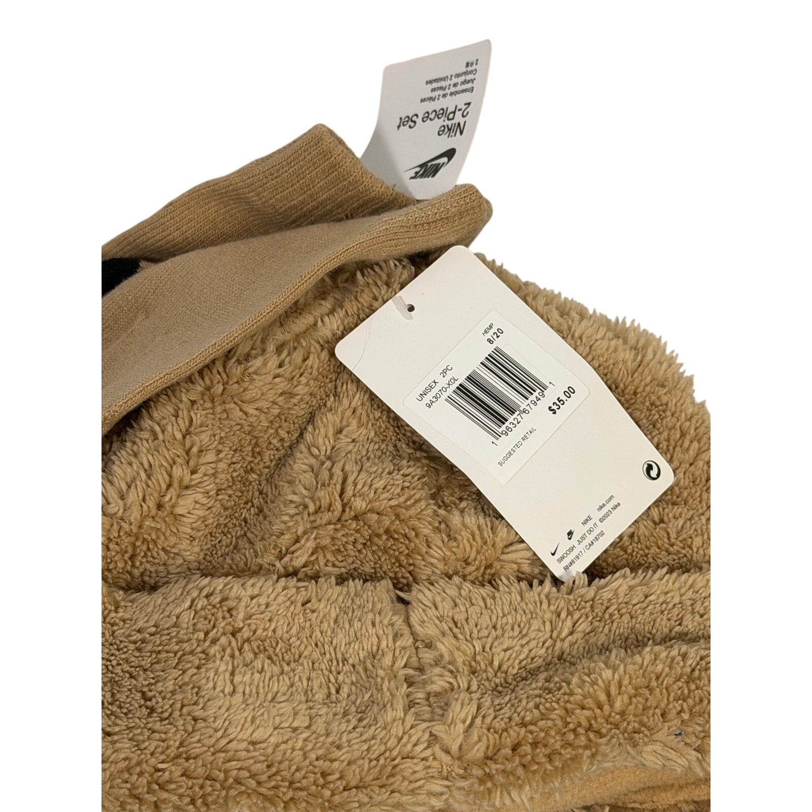 Nike tan sherpa neck warmer and touchscreen gloves 2-piece set, featuring a hat and warm winter accessories with soft lining.