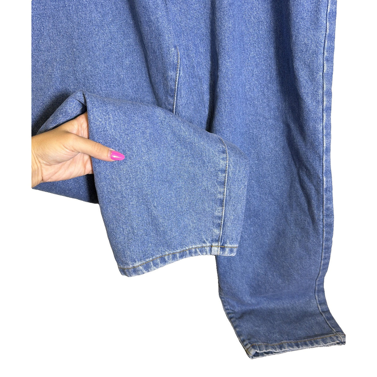 Light blue Nasty Gal organic denim mom jeans in plus size 14, showing the relaxed fit and classic jean details.