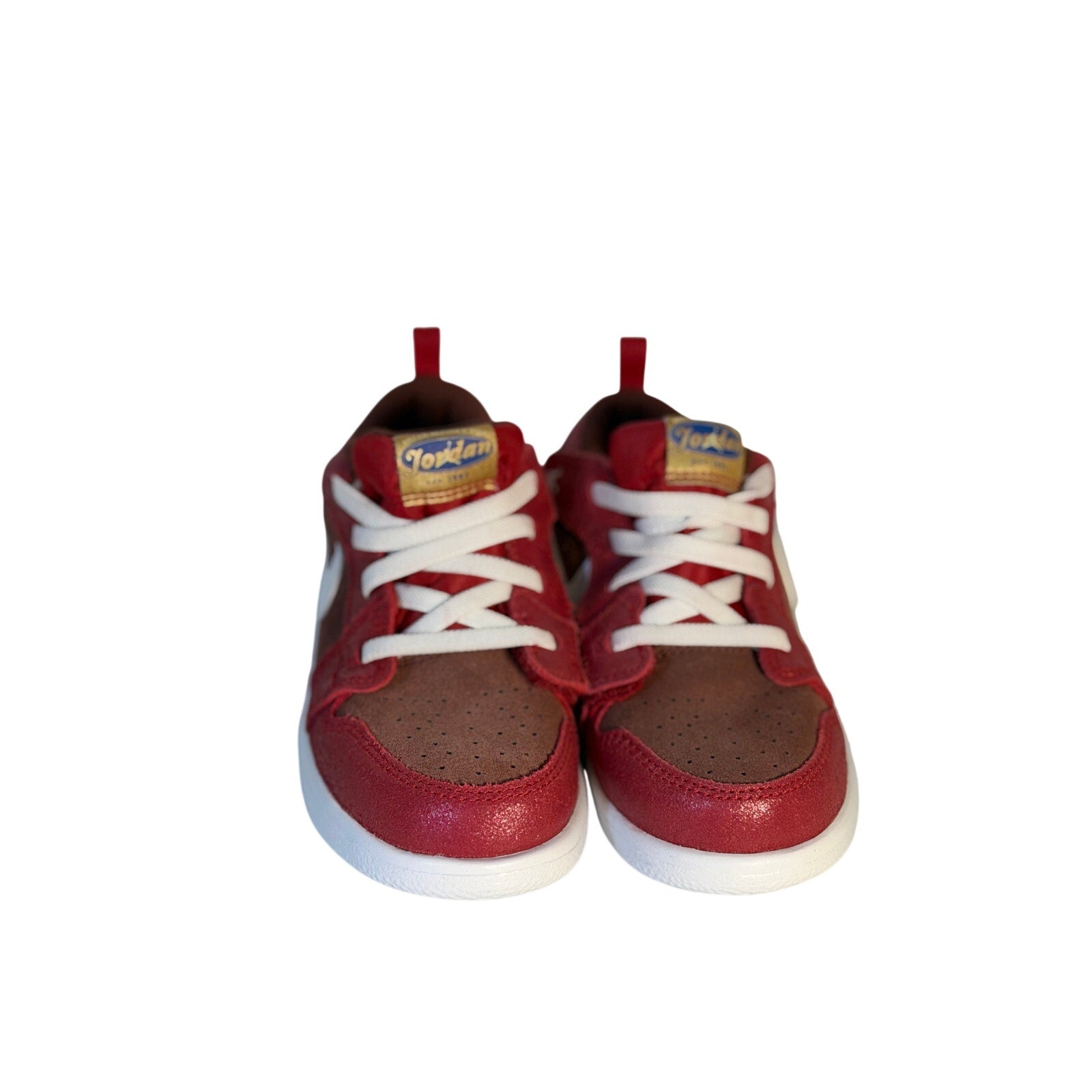 Red, brown, and white Air Jordan 1 Low ALT toddler sneakers with hook and loop straps, designed for comfort and style.