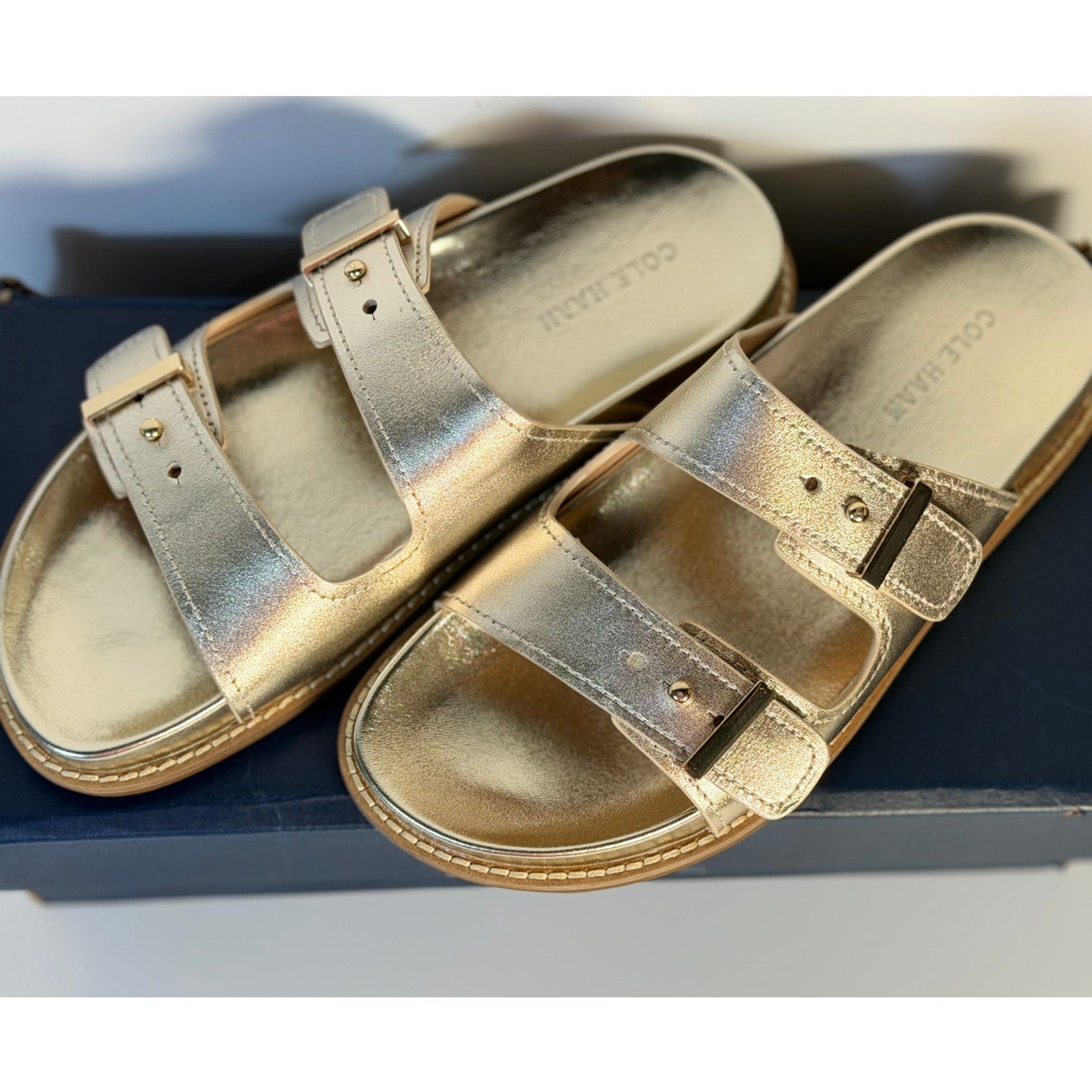 Cole Haan women's gold leather double strap sandals with footbed, size 7B, featuring stylish and comfortable design.
