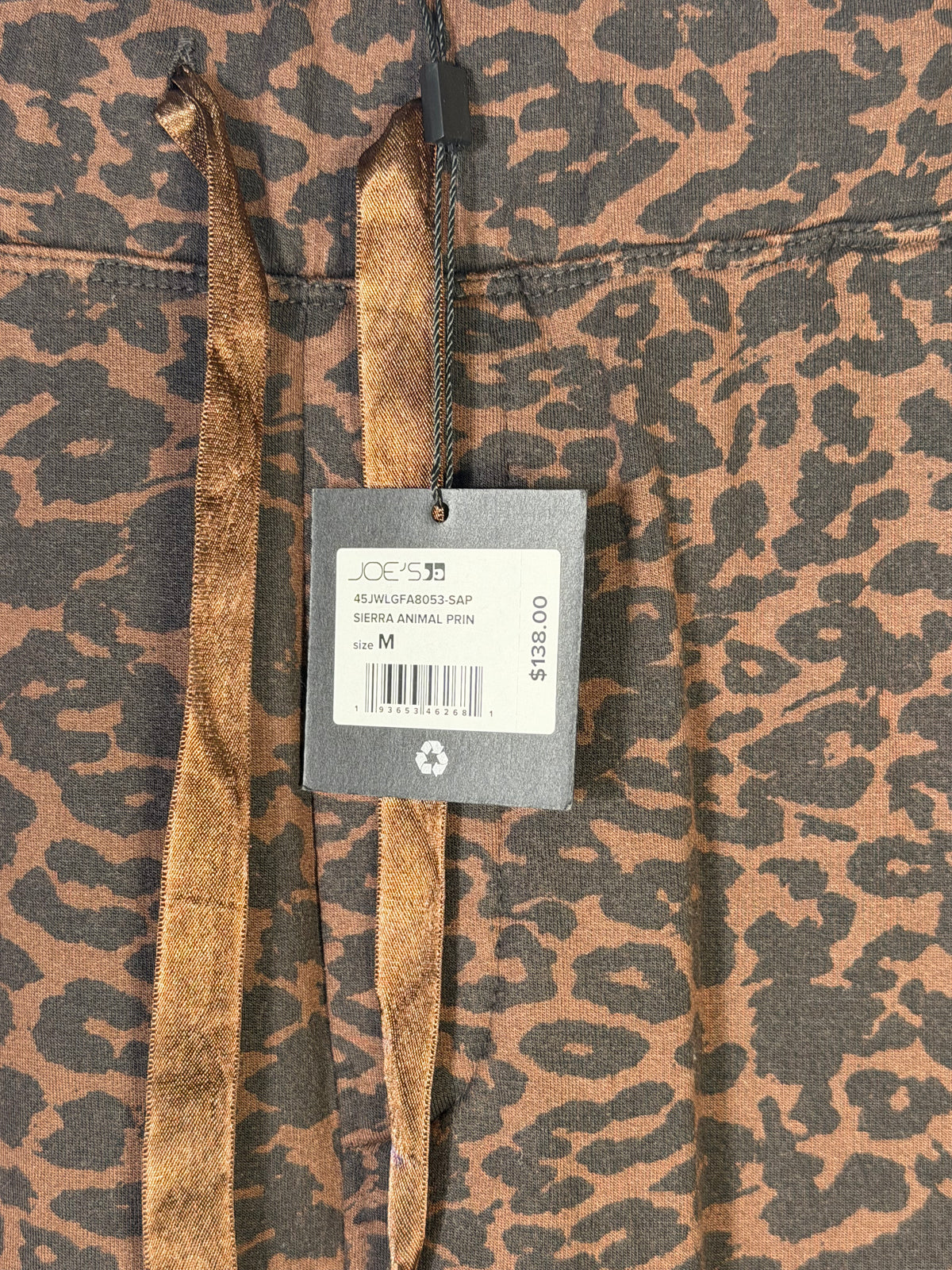 Joe's Sierra animal print jogger pants in brown, size M, showcasing comfortable casual clothing with a stylish animal pattern.