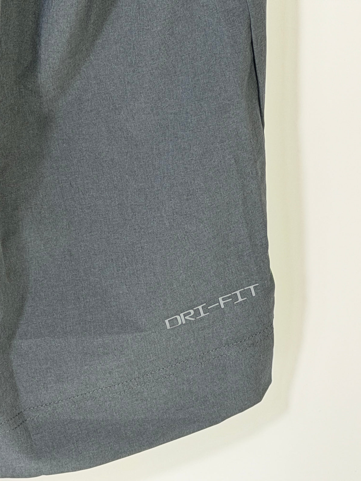 Men's Nike Dri-FIT Football Sideline Polo in gray, large size, featuring Nike logo and athletic polo design.