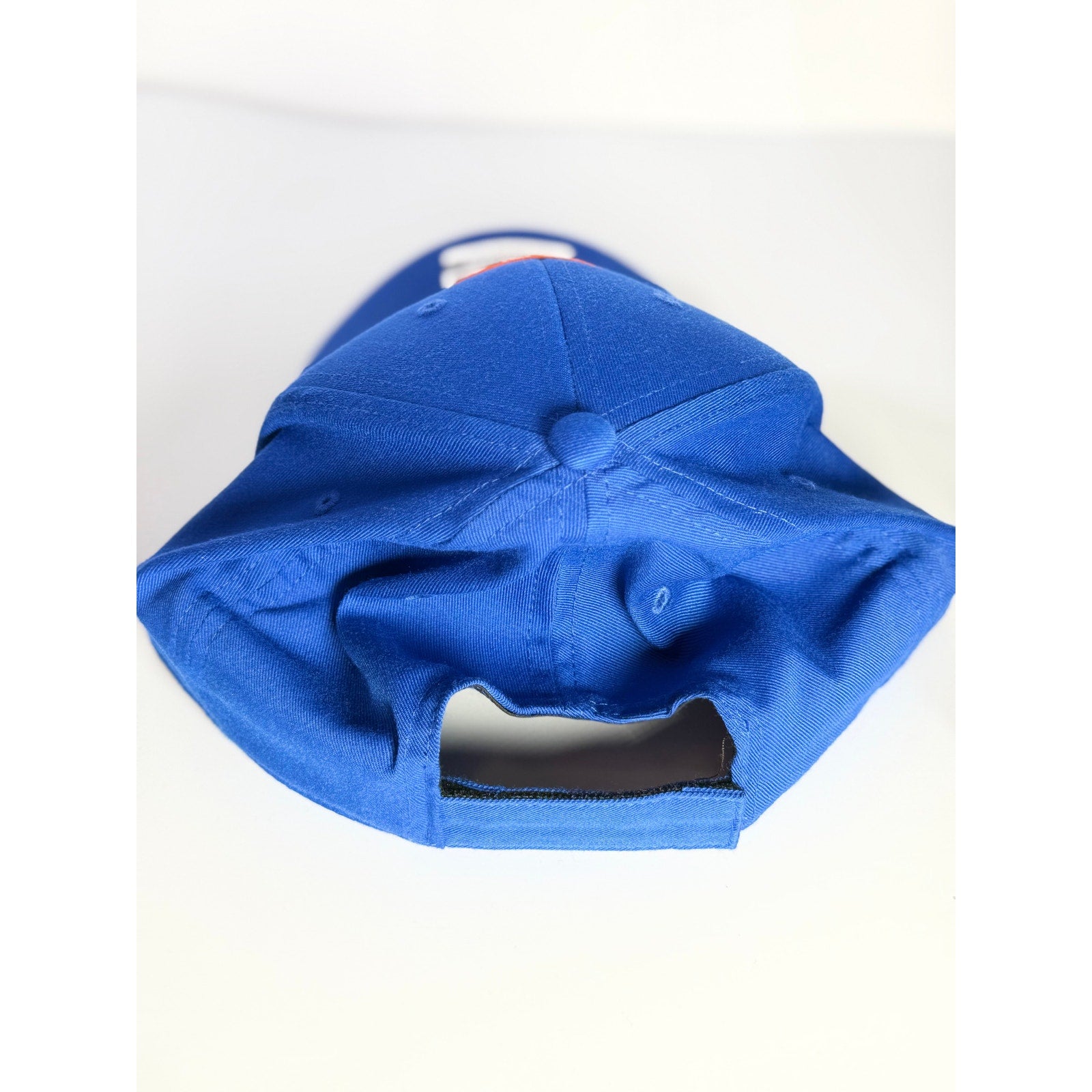 Fanatics New York Islanders adjustable blue NHL hockey cap with team logo, structured brim, and adjustable strap.