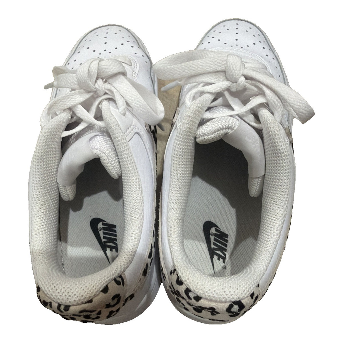Nike Court Vision Low Leopard Swoosh white sneakers for women, size 8.5, featuring leopard print accents and Nike branding.