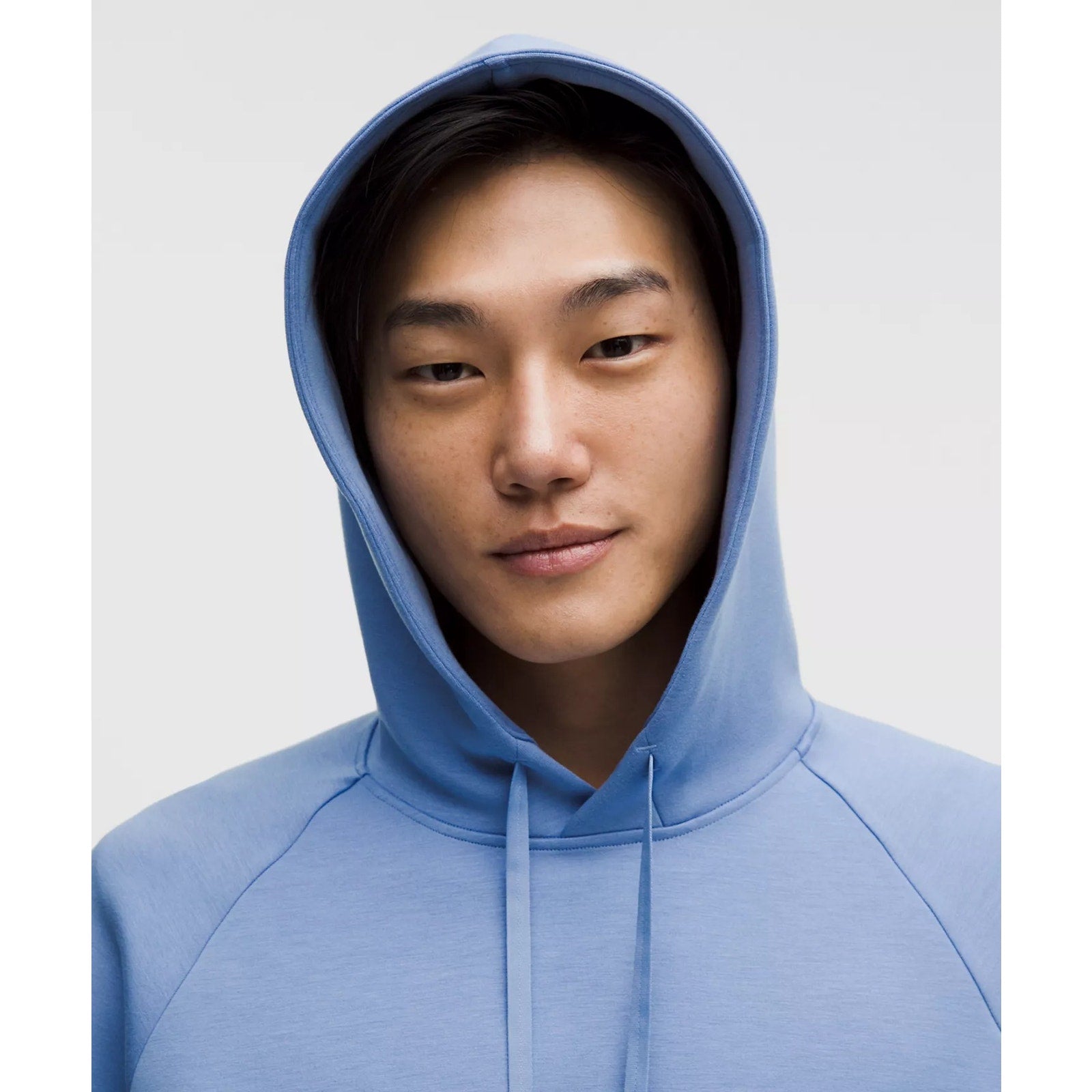 Men's blue Lululemon Smooth Spacer Pullover Hoodie, size XL, showing soft fabric and casual fit.