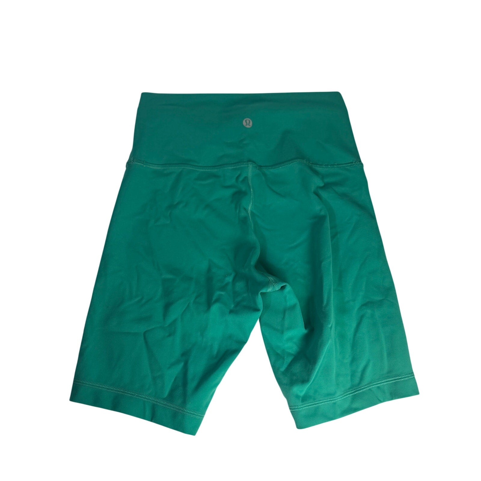 Lululemon women's high-rise teal green biker shorts, size 6, made of stretchy athletic fabric, shown laid flat.
