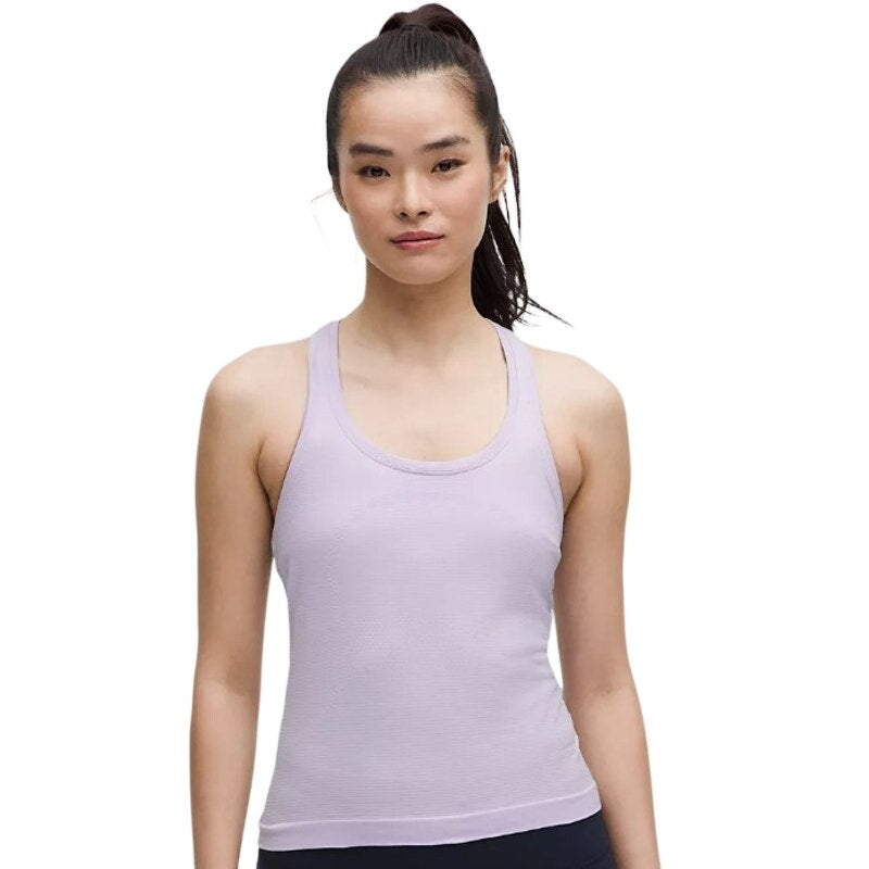 Lululemon Athletica Swiftly Tech Racerback Tank Top 2.0 in Lavender Frost, women's size 12, showcasing the fitted athletic top.