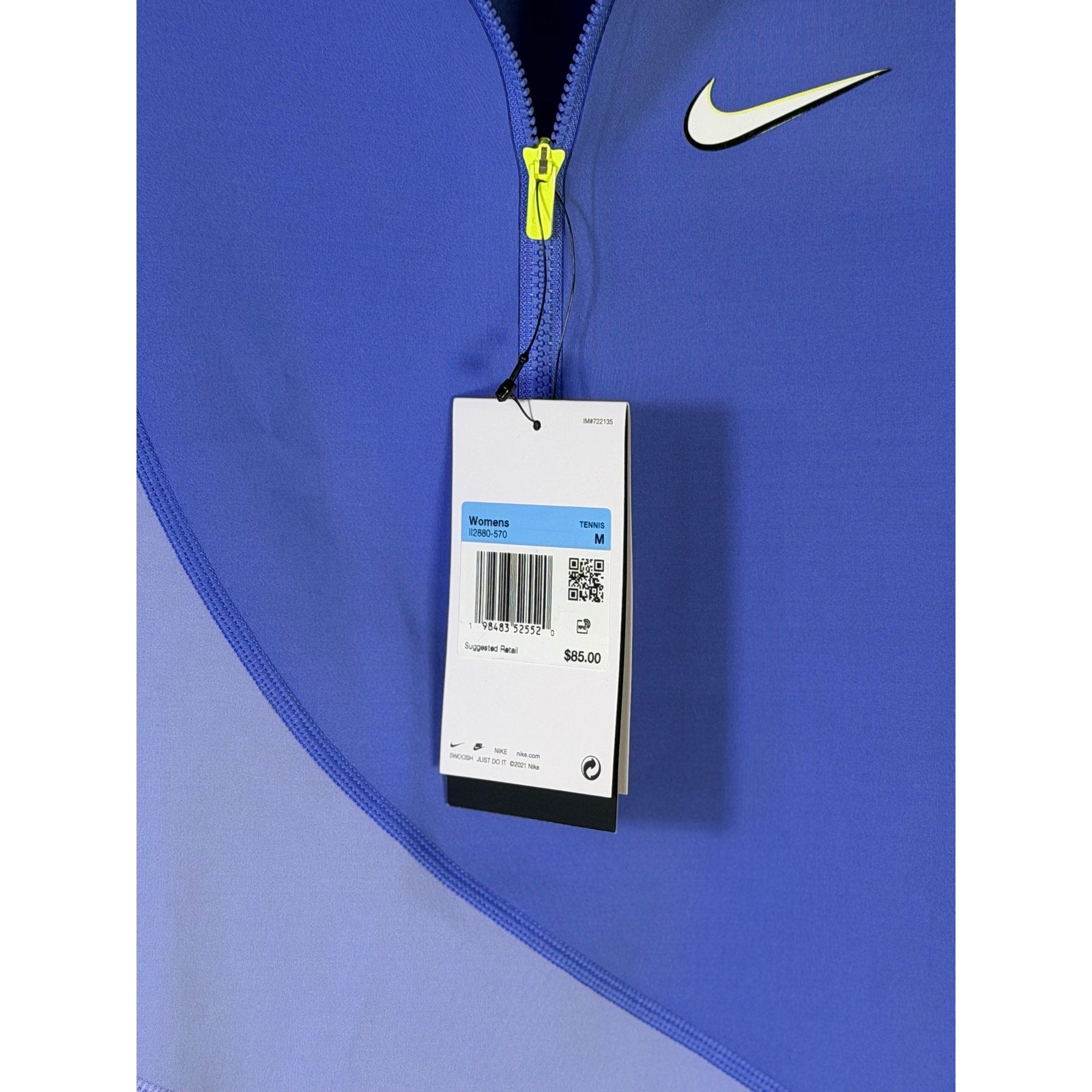 Nike women's sleeveless quarter-zip crop tank top in blue lime, size M, new with tags, athletic workout clothing.