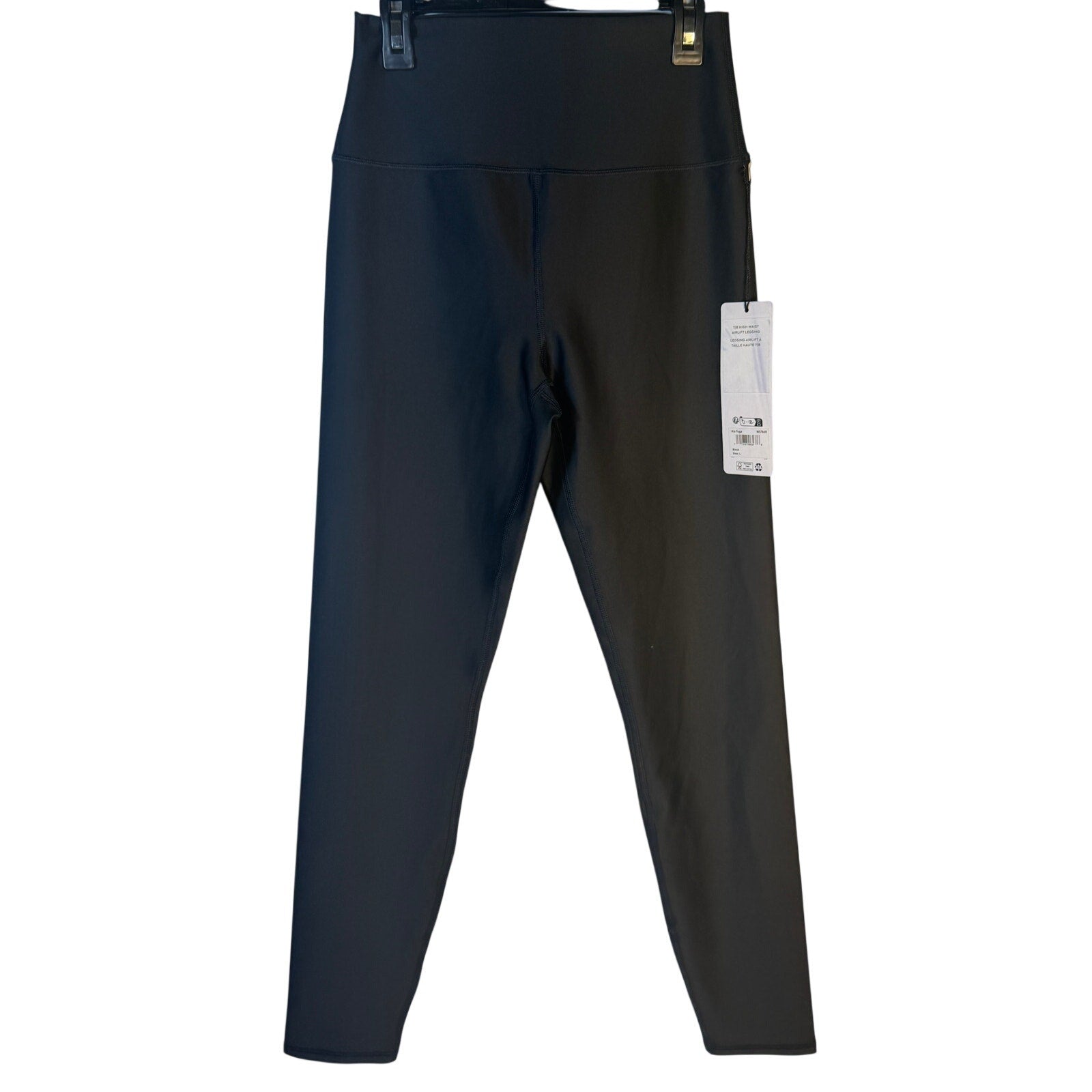 Black Alo Yoga Airlift 7/8 high waist leggings for women, showing the sleek, fitted design and high-rise waistband.
