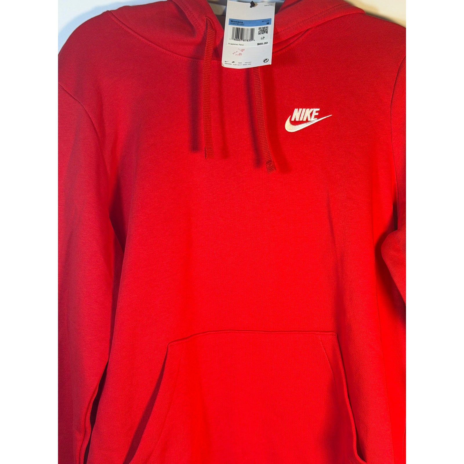 Red Nike Sportswear Club Fleece hoodie for women, medium size, showing front view with Nike logo and soft fleece fabric.