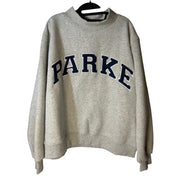 Women's gray PARKE oversized fleece sweatshirt with mock neck, embroidered logo, and relaxed fit.