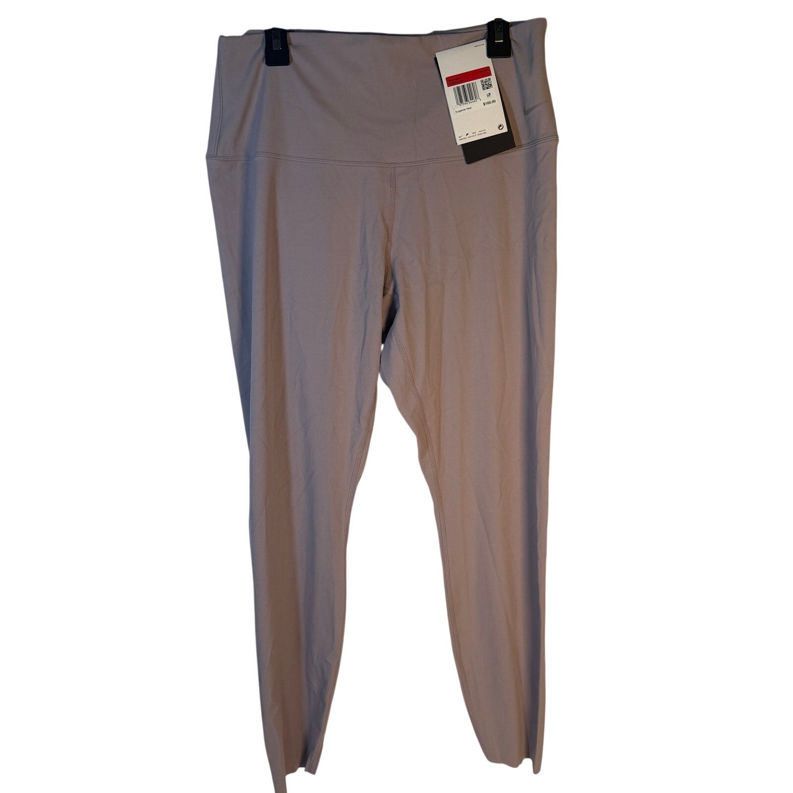 Nike Go High Rise full-length women's leggings in taupe, large size, designed for training and athletic wear.