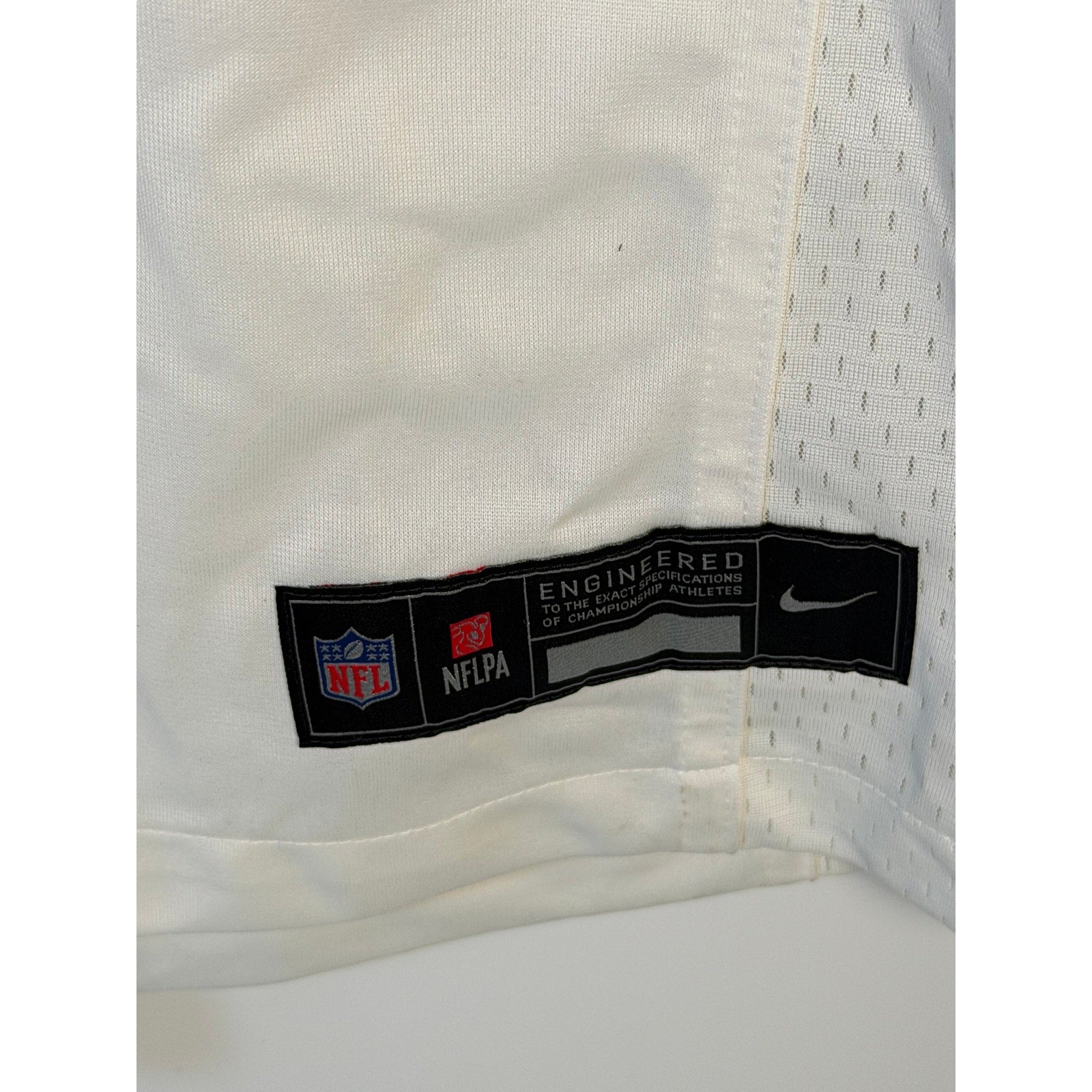 Nike Christian McCaffrey #23 San Francisco 49ers white NFL jersey for men, size large, new with tags, front view.